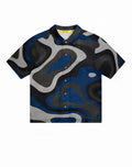 SupaWear short sleeve mesh shirt in blue combo print with blue gray and black abstract wave pattern and button-up front