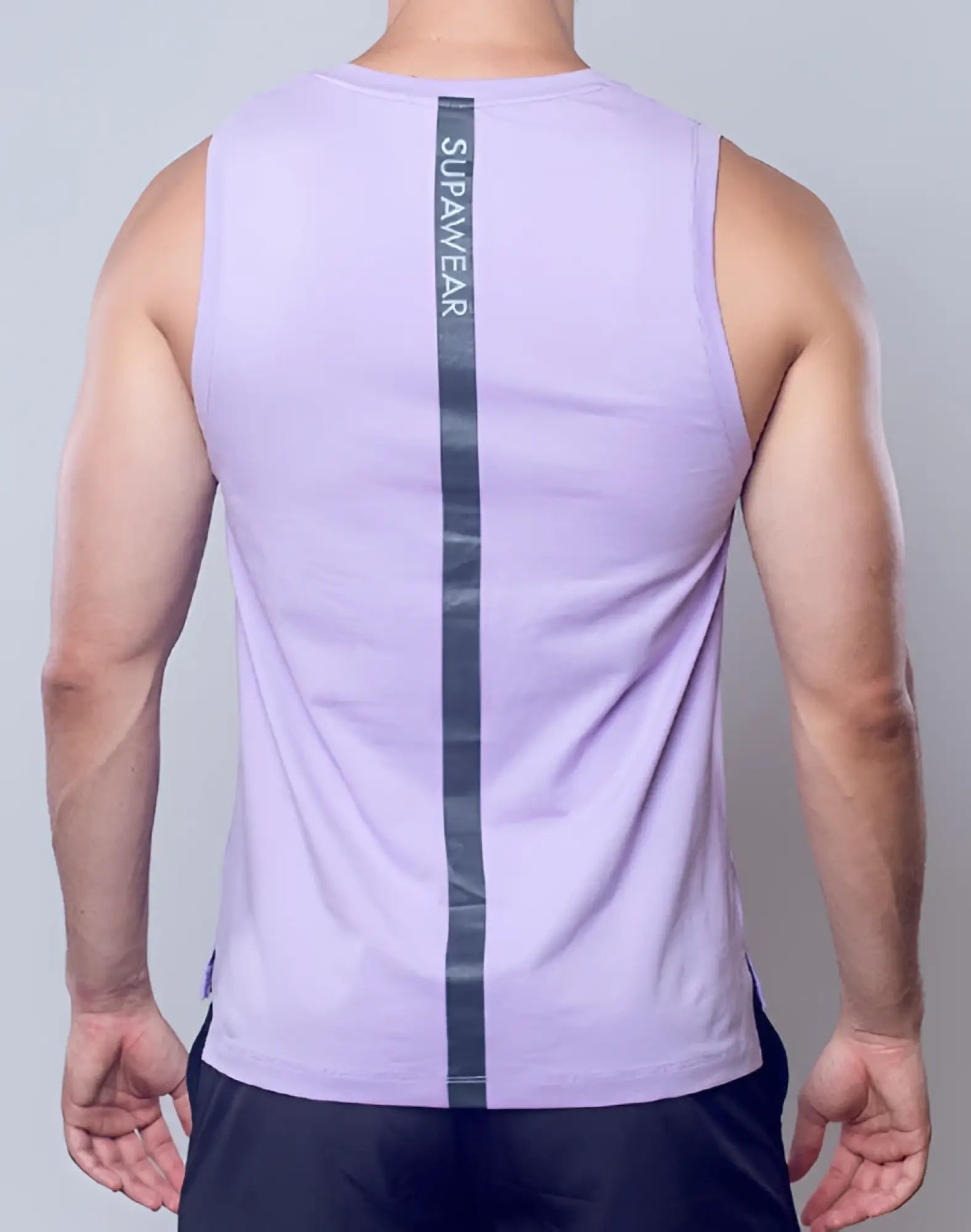 Back side of a lavender solid and mesh athletic tank top with a vertical black stripe and supawear branding