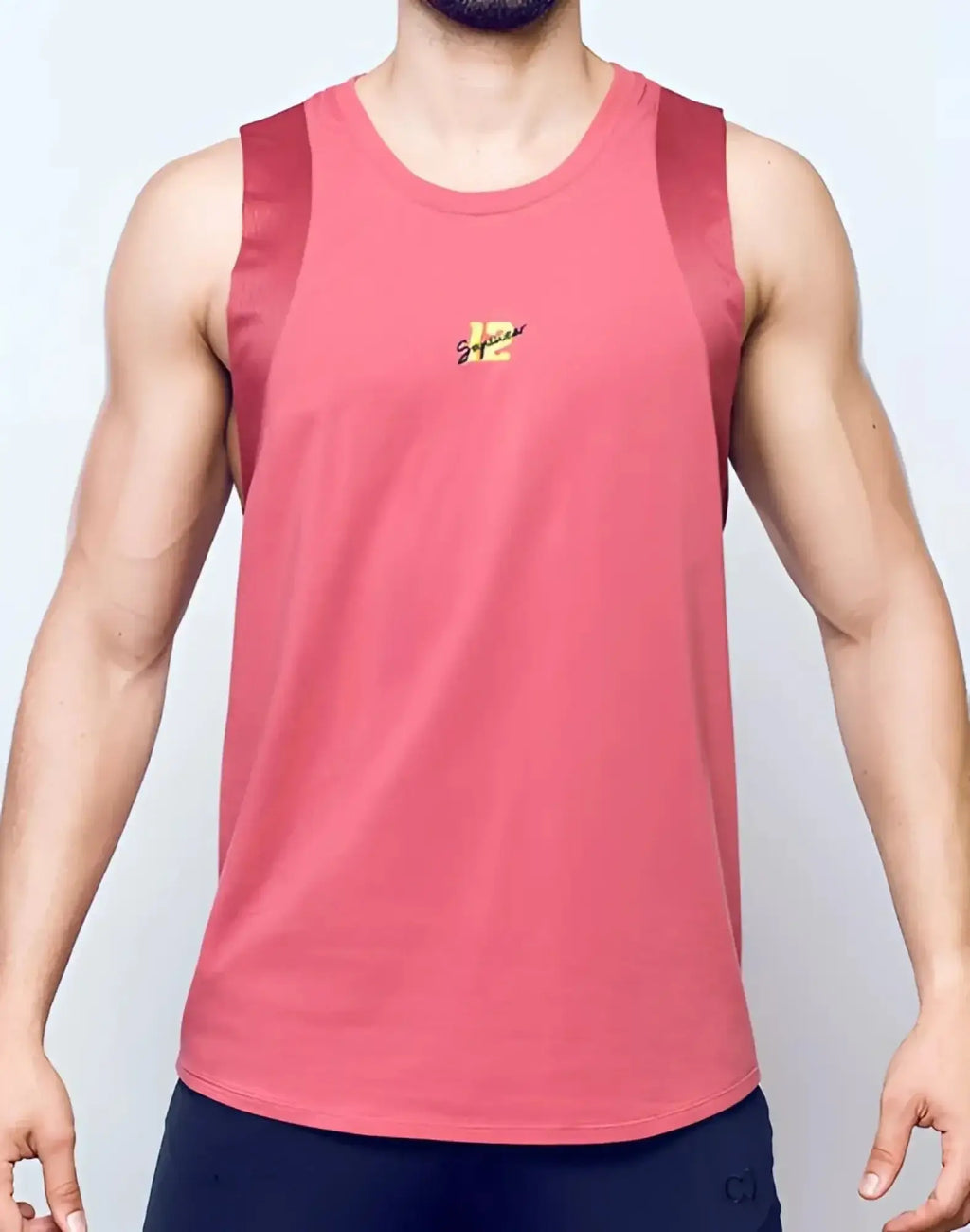 SupaWear sport tank top in dusty cedar rose with coral color mesh shoulder panels and small chest embroidered logo
