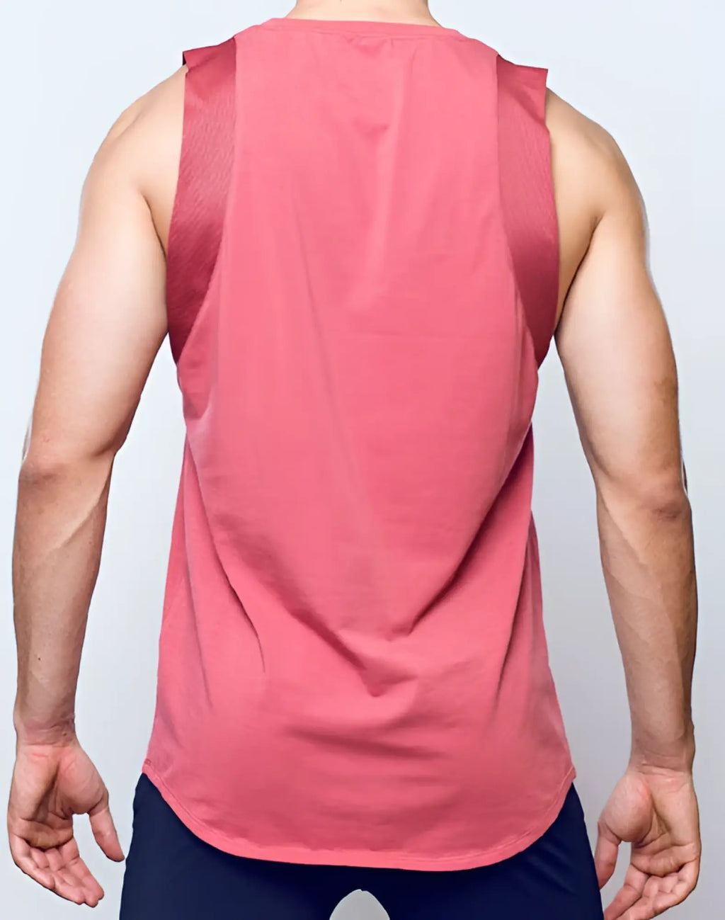 SupaWear sport tank top in dusty cedar rose with mesh shoulder panels designed for athletic wear
