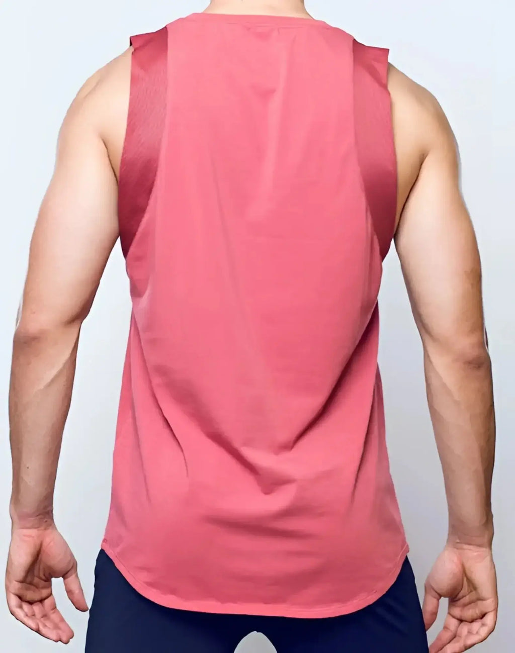SupaWear sport tank top in dusty cedar rose with mesh shoulder panels designed for athletic wear
