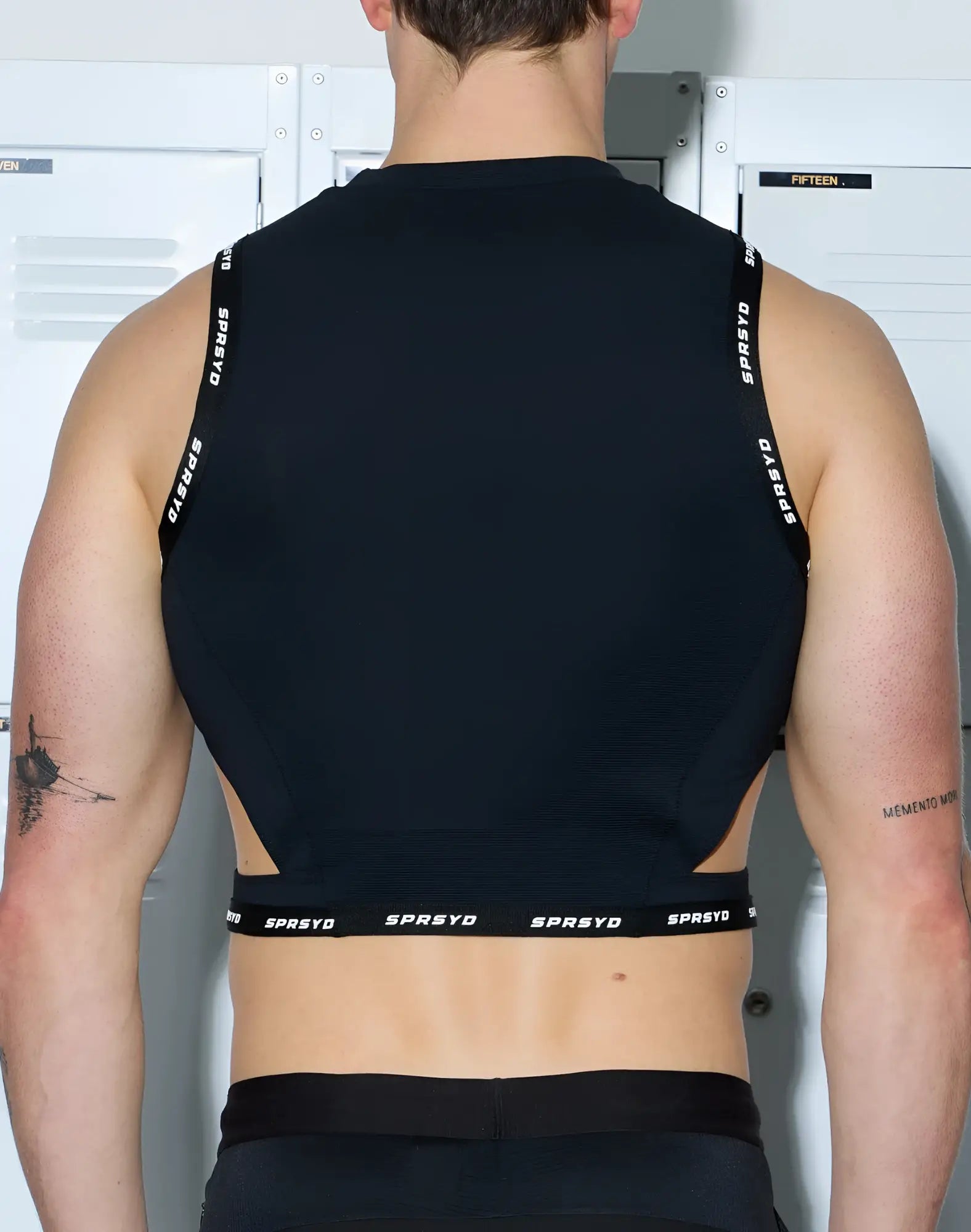 Black sleeveless SUPAWEAR SPR cropped tank with white sprseyd branding on straps and waistband for athletic wear