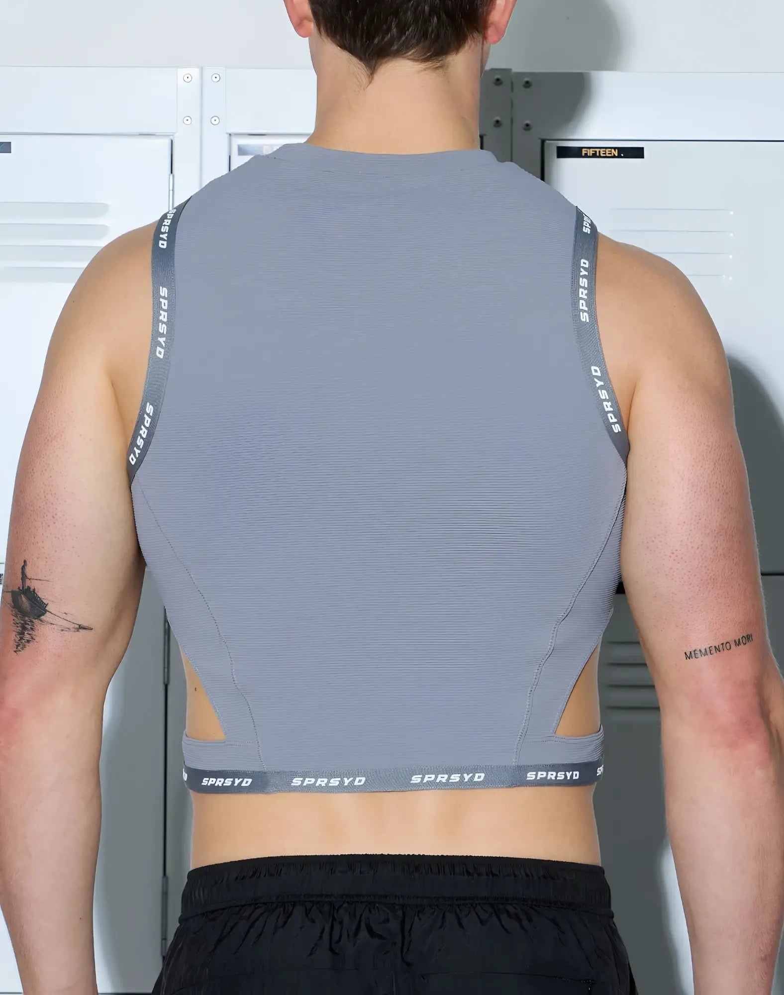 Gray sparcyd athletic tank top with ribbed texture and SUPAWEAR branded straps for active wear