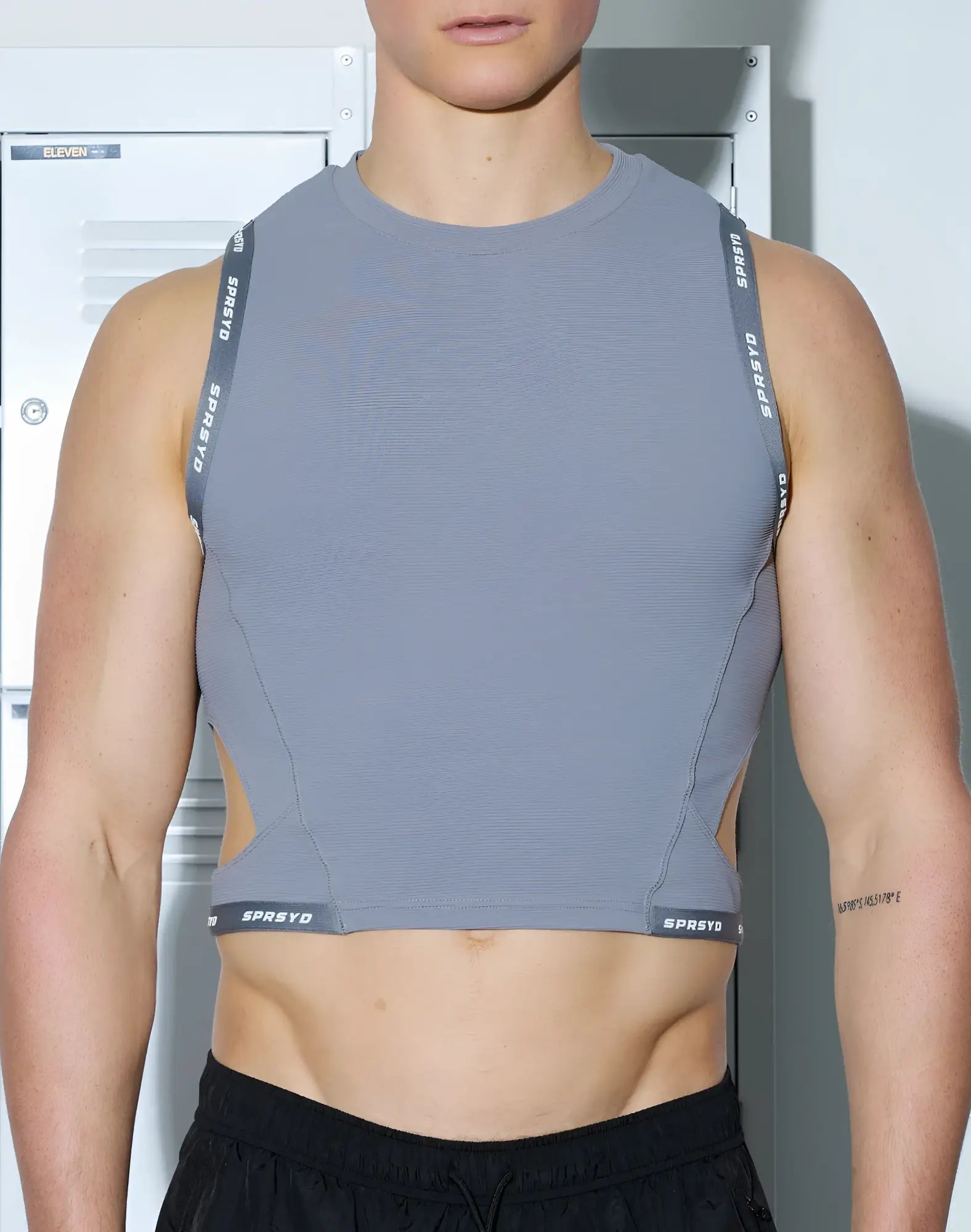 Gray textured sleeveless athletic cropped tank with branded straps and hem by supawear for activewear