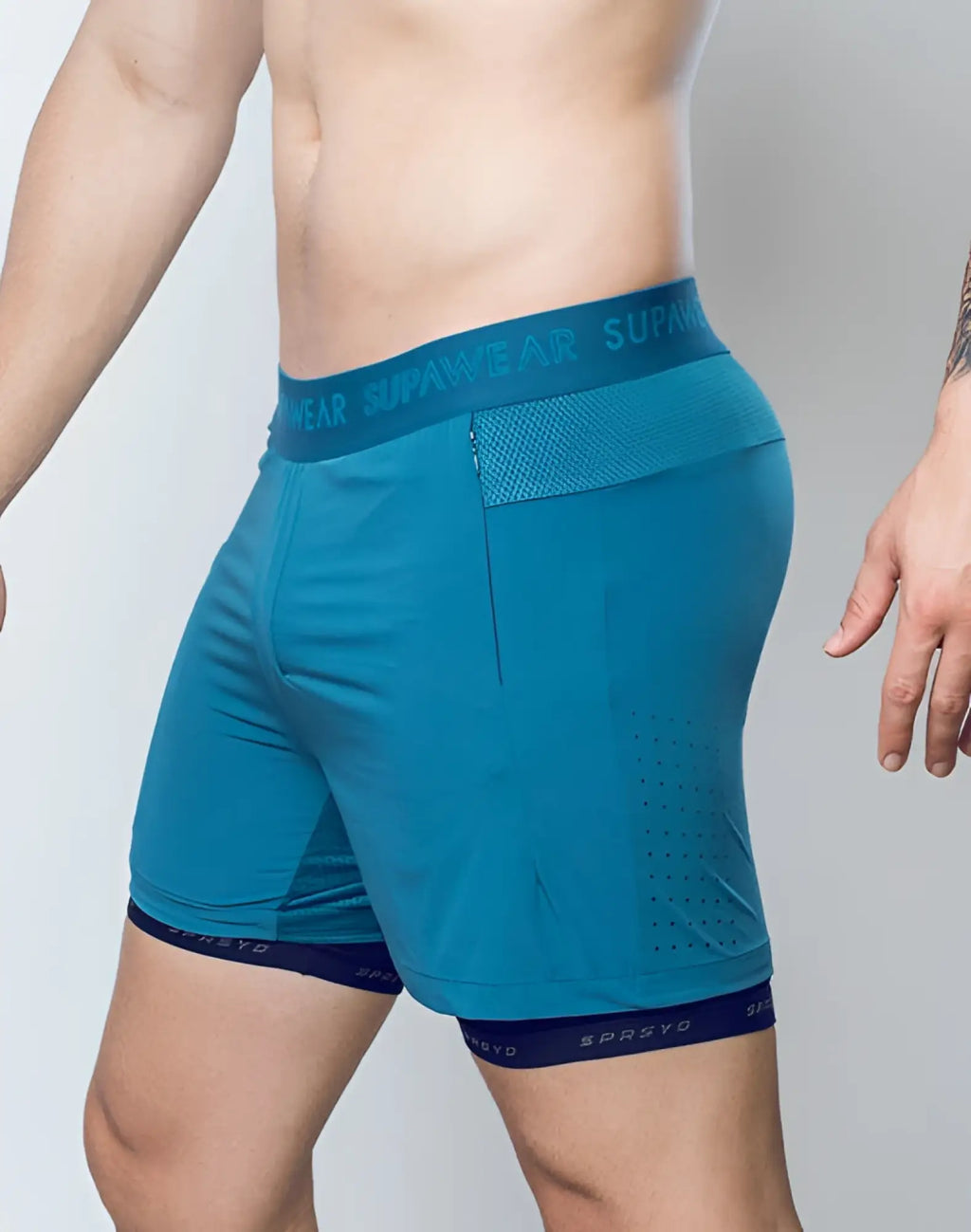 Teal and navy blue supawear spr flex athletic boxer briefs with perforated mesh side panel and branded waistband