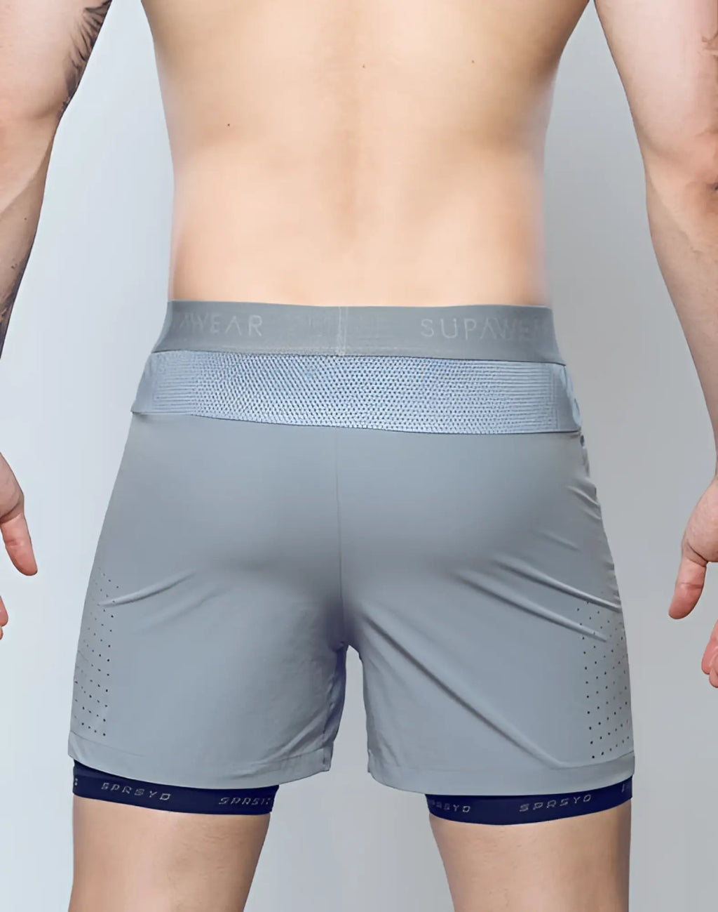 SupaWear SPR flex shorts in titanium grey with gray mesh waistband navy blue trim and spreyd brand name