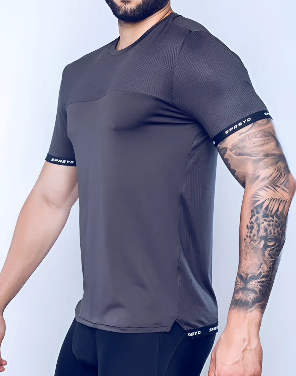 SupaWear SPR Flex Tee black dark gray athletic short sleeve shirt with subtle textured pattern and black branded cuffs