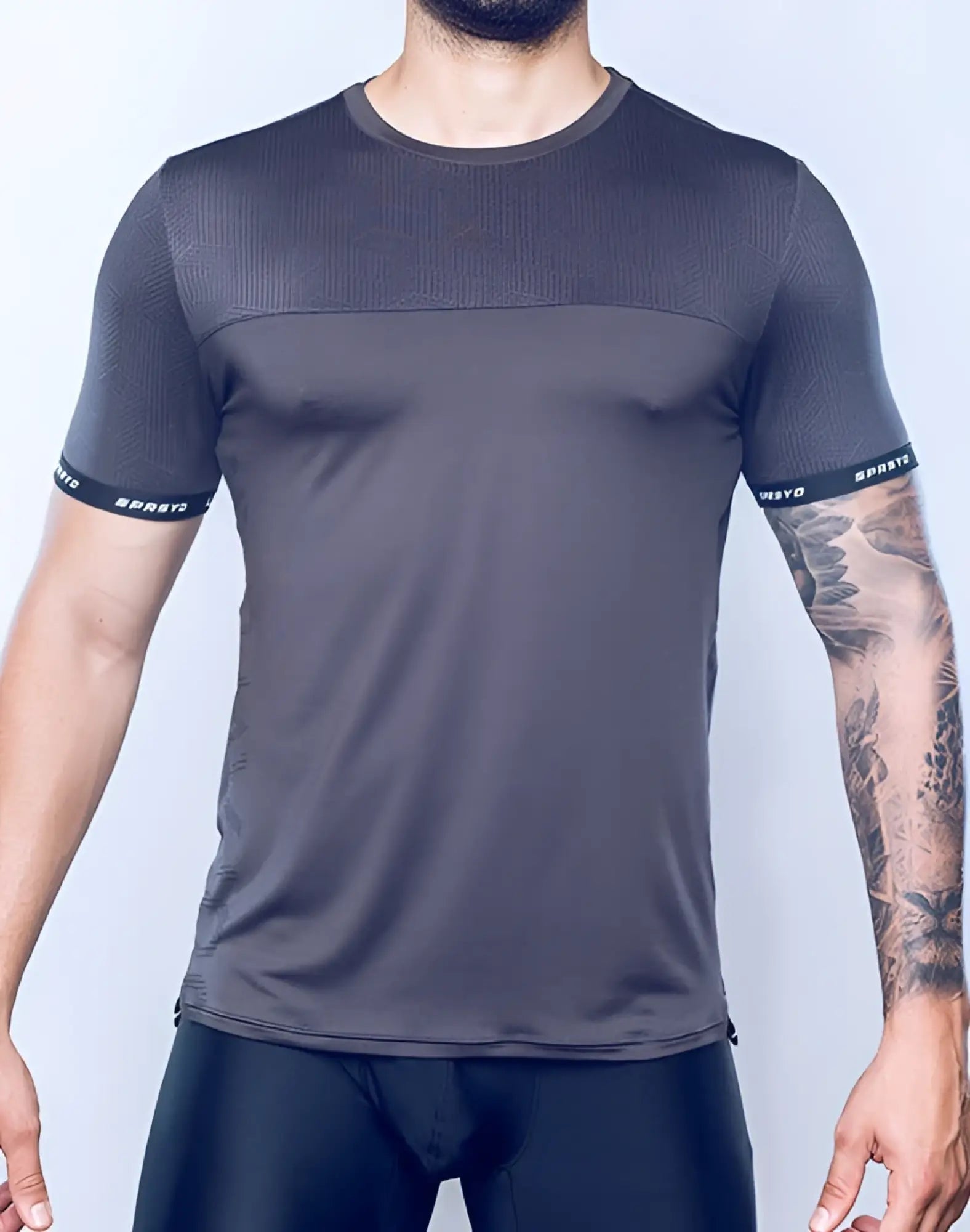 Supawear spr flex tee black dark gray athletic t-shirt with subtle geometric pattern and black sparto branding on sleeve cuffs