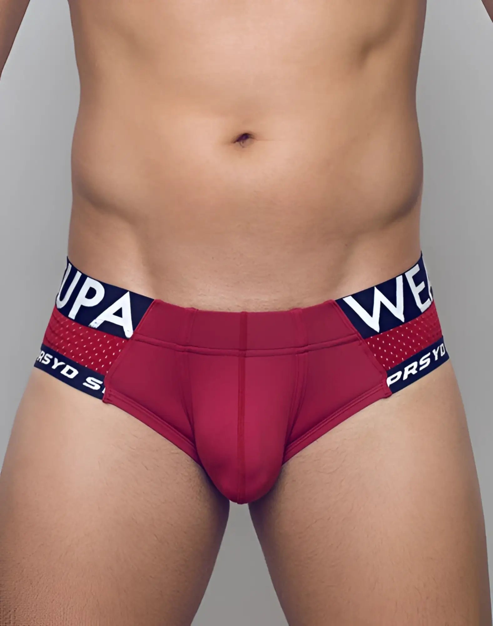 Maroon SUPAWEAR SPR Max Brief underwear with navy blue elastic waistband and red mesh detailing for athletic use