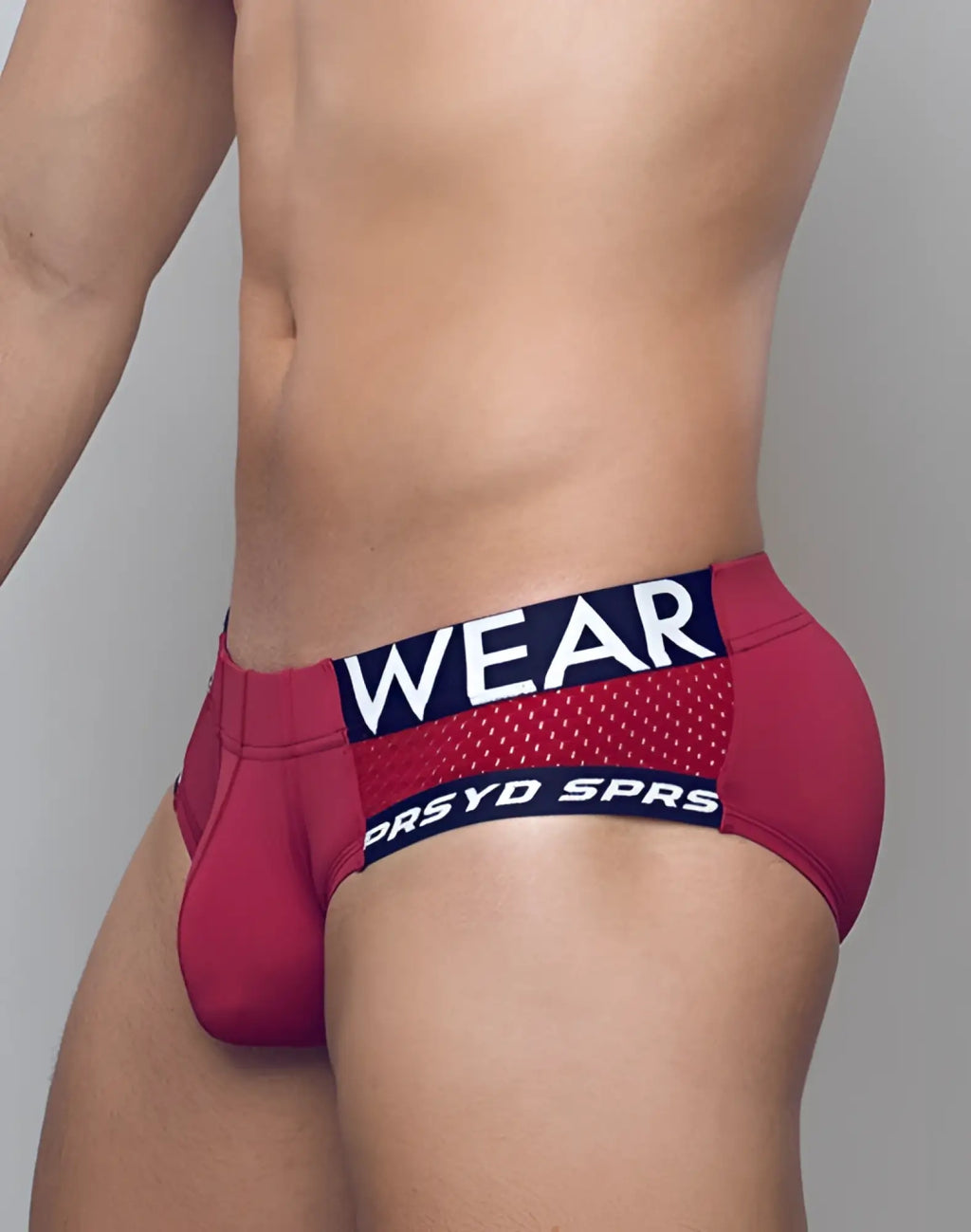Red supawear spr max brief athletic underwear with navy blue elastic waistband and white lettering for active wear