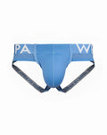 Light blue men’s briefs with white paw logo on waistband and gray suspenders with repeating text by supawear