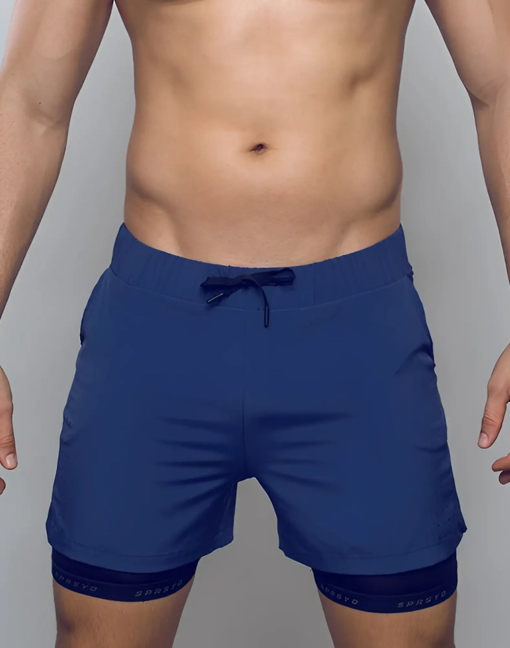 Navy blue SUPAWEAR SPR Max shorts with drawstring waistband and matching inner liner for athletic use