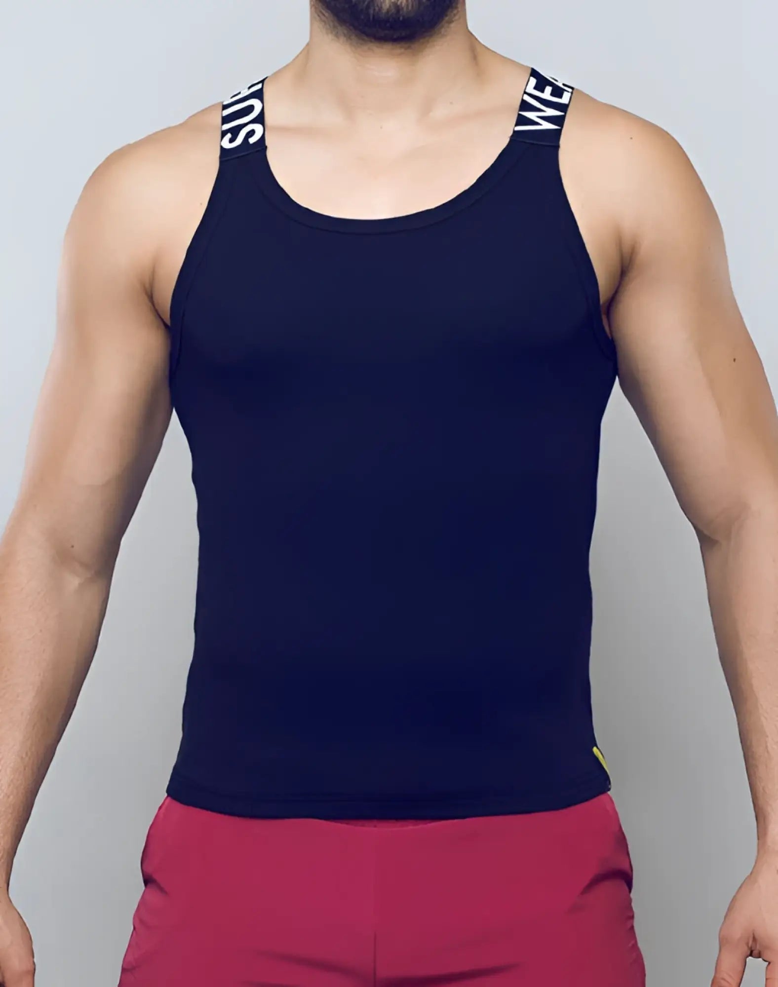 Black SUPAWEAR SPR Max Singlet ribbed tank top with white super lettering on shoulder straps for activewear use
