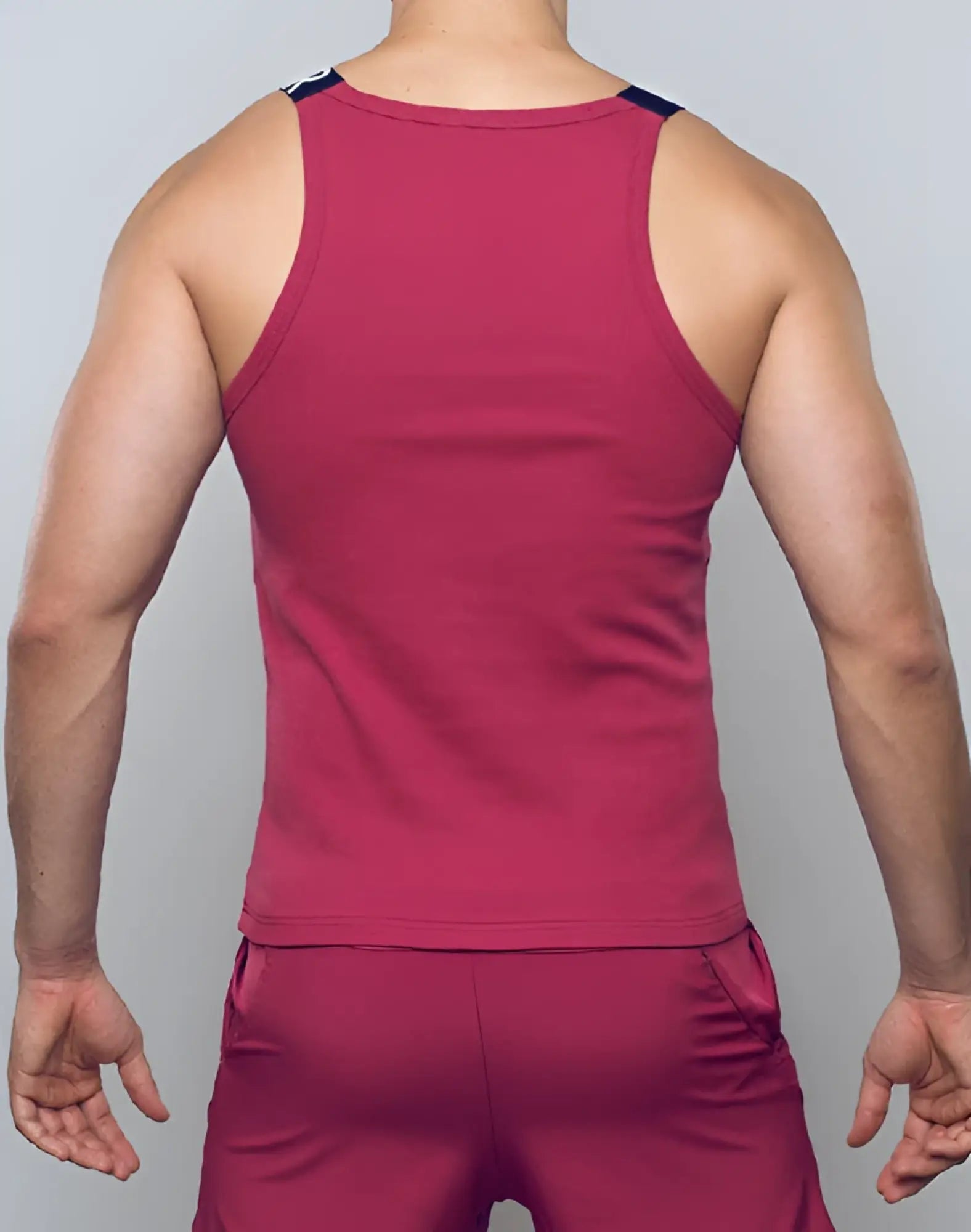 SupaWear SPR Max singlet redbud is a maroon ribbed tank top with navy blue trim shoulder straps for casual wear