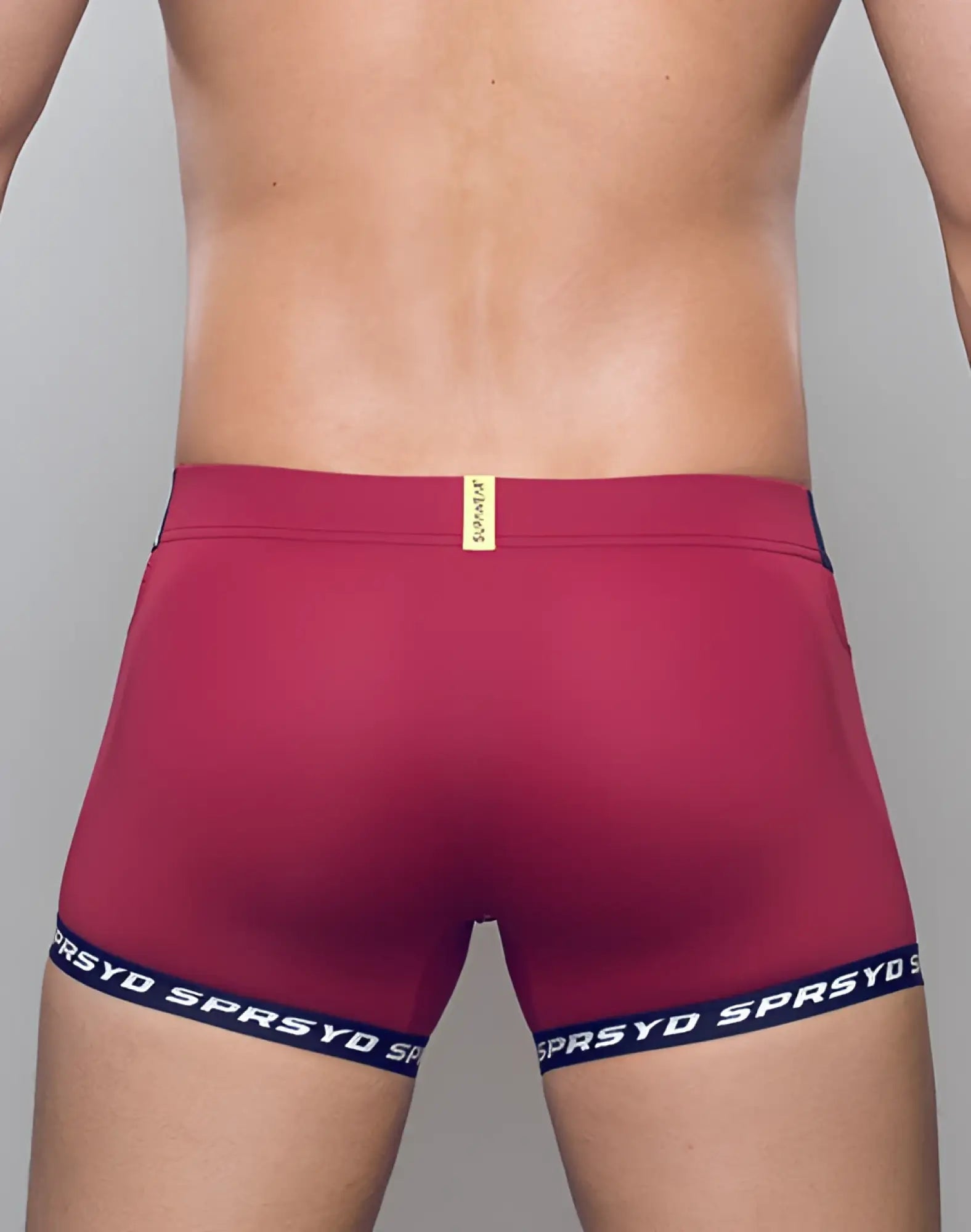 Magenta supawear spr max trunk underwear with black elastic waistband and leg bands featuring sprsyd branding
