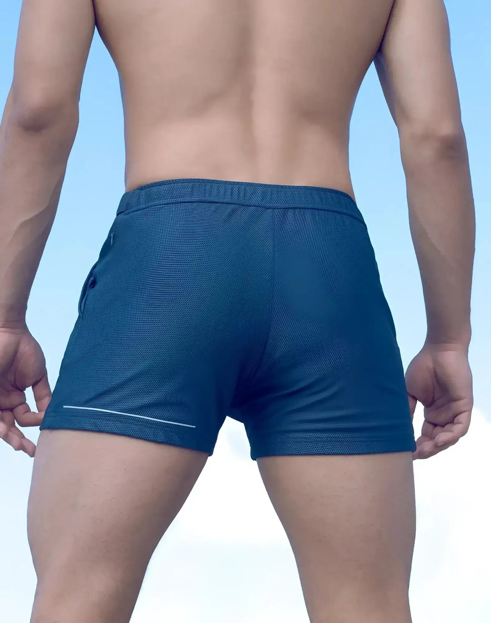 SupaWear SPR mesh shorts in blue with textured fabric and subtle white trim along the side seam