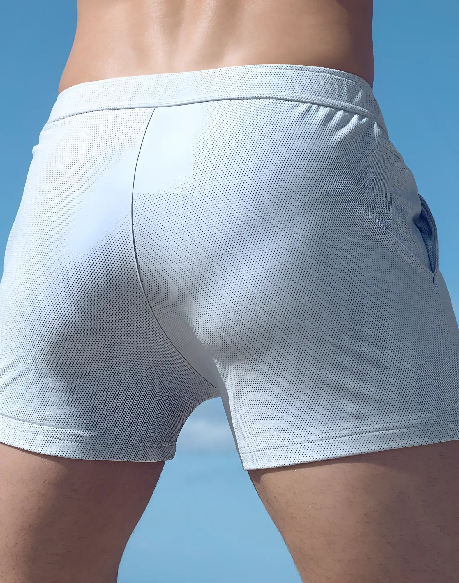 SupaWear SPR mesh grey athletic shorts with textured breathable fabric and blue accent stitching on the side seam