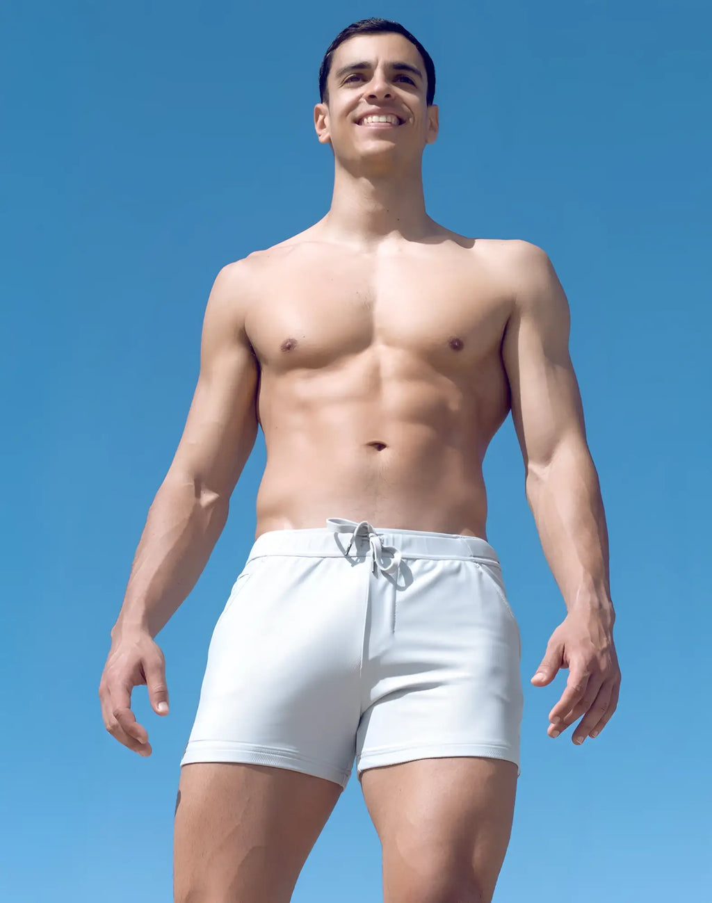 White athletic shorts with drawstring waistband designed for comfort and performance in supawear spr mesh shorts gray