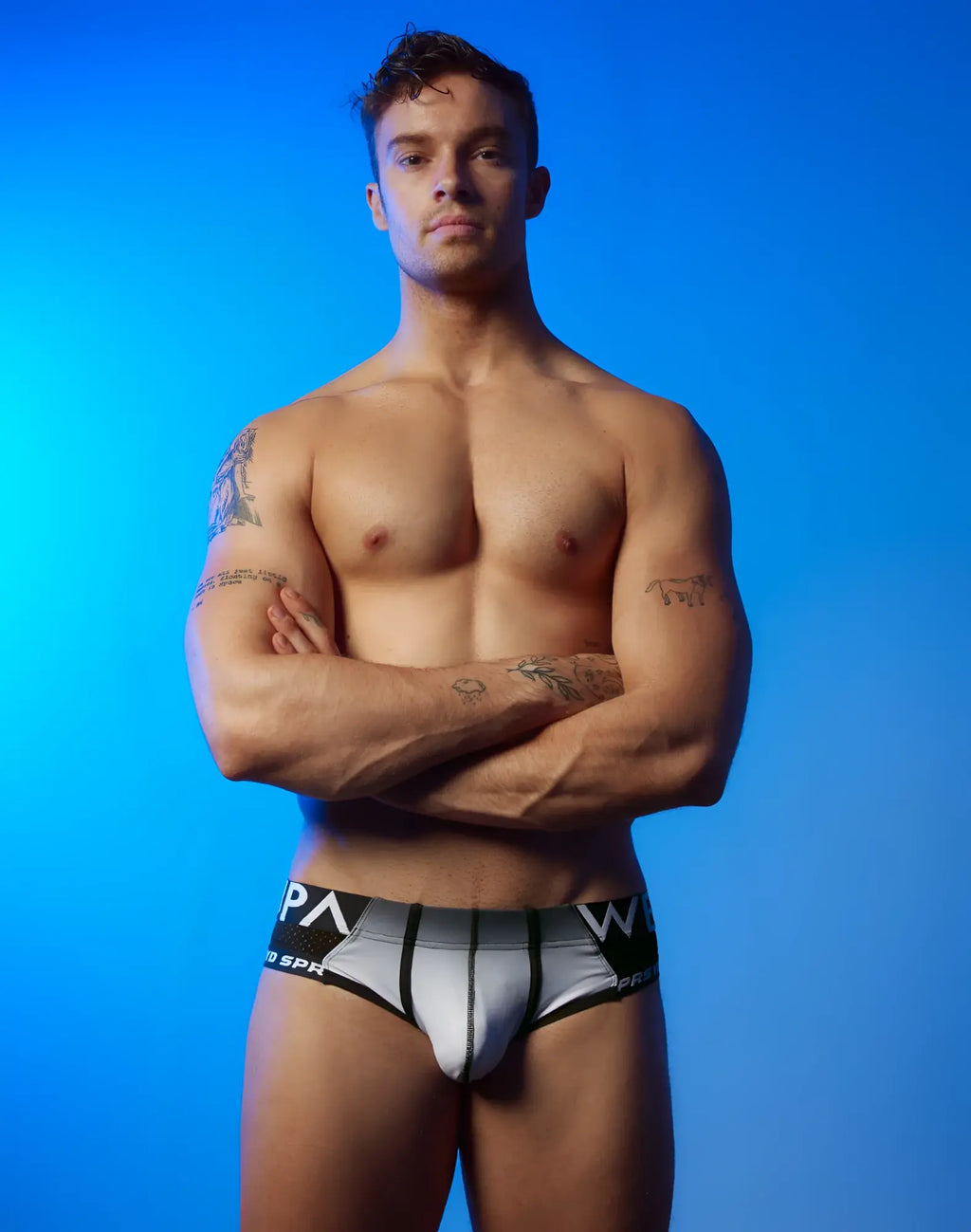 Black and white SUPAWEAR SPR performance gradient brief underwear with bold waistband lettering and sleek modern design