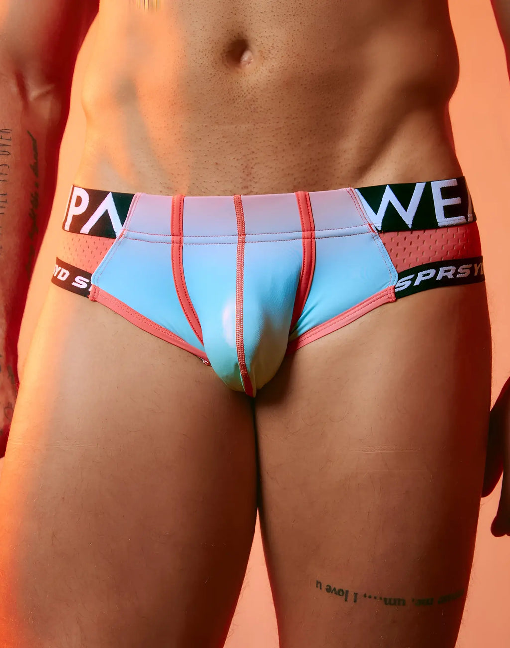 SupaWear SPR performance gradient brief underwear in light blue and pink with black waistband and white lettering