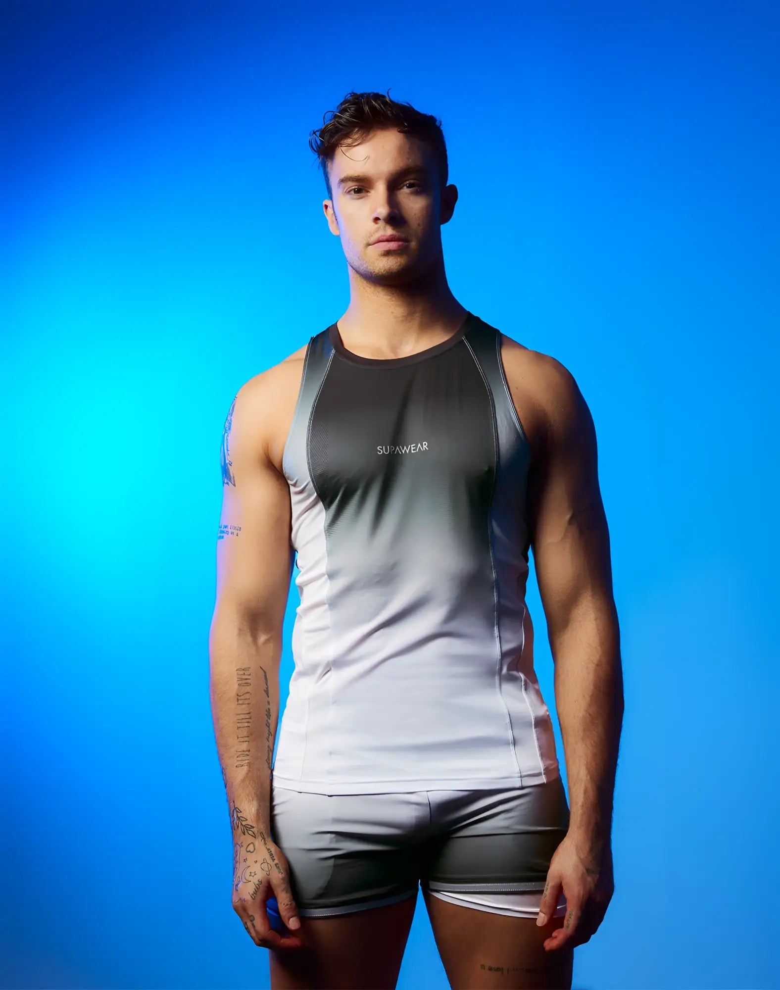 A supawear spr performance gradient singlet black and white athletic tank top with two-tone gray and white design