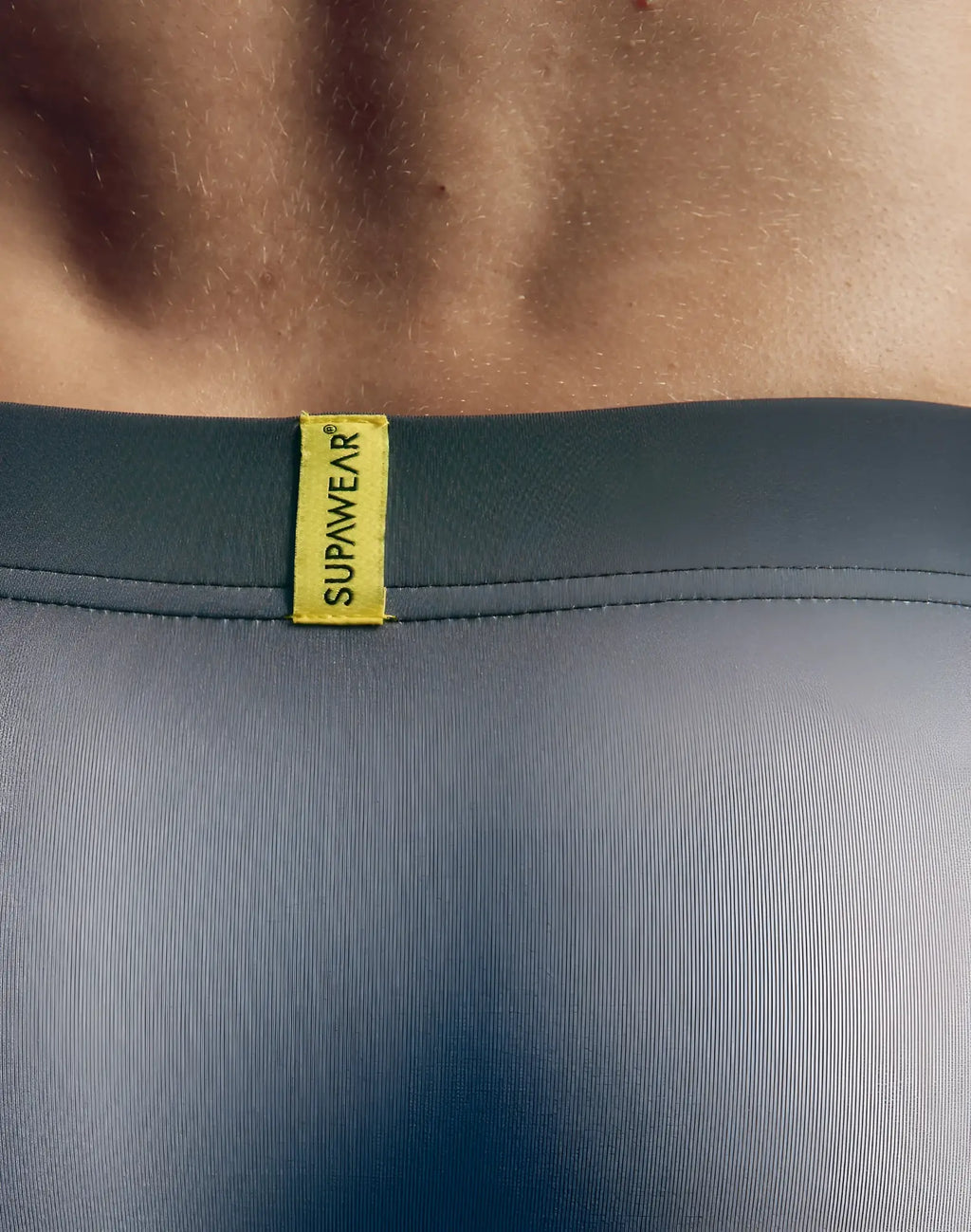 Dark gray supawear spr performance gradient trunk underwear with bright yellow brand tag and black white colors
