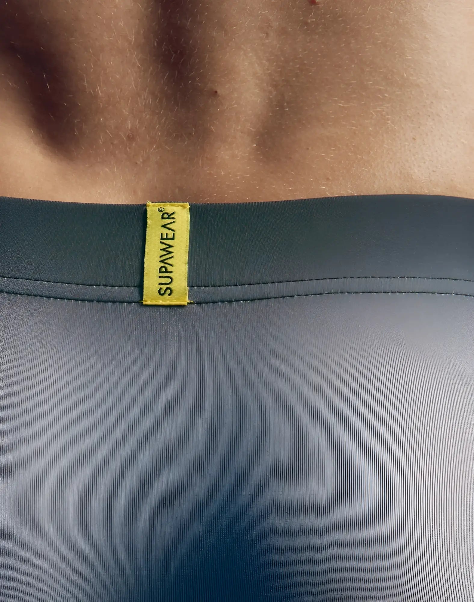 Dark gray supawear spr performance gradient trunk underwear with bright yellow brand tag and black white colors