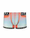 SupaWear SPR performance gradient swim trunks with neon orange trim and black waistband featuring white lettering
