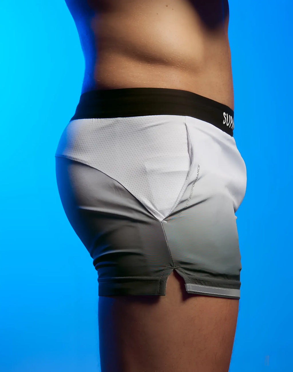 SupaWear SPR performance athletic briefs in white and gray gradient with black waistband featuring sup logo