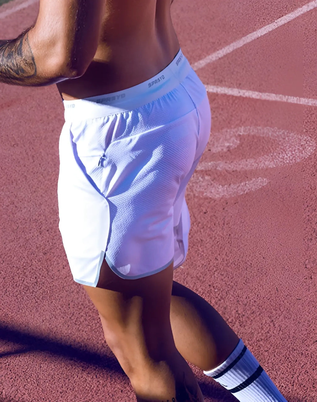 SupaWear SPR racer shorts white with mesh texture elastic waistband and subtle side pockets for athletic use