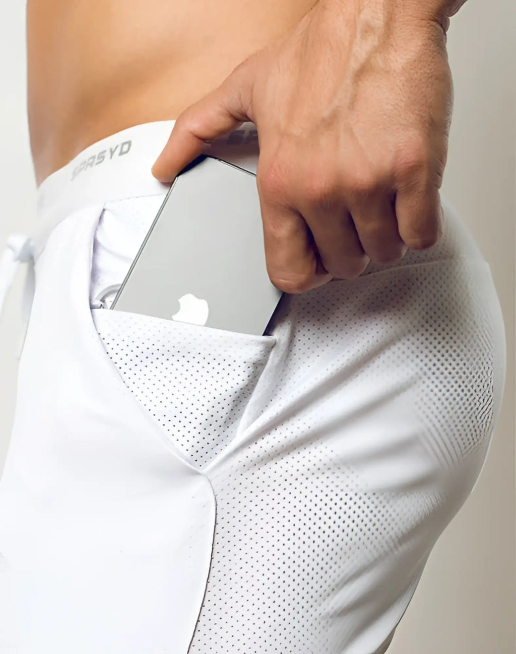 SupaWear SPR racer shorts white perforated athletic fabric with sleek silver iPhone in side pocket