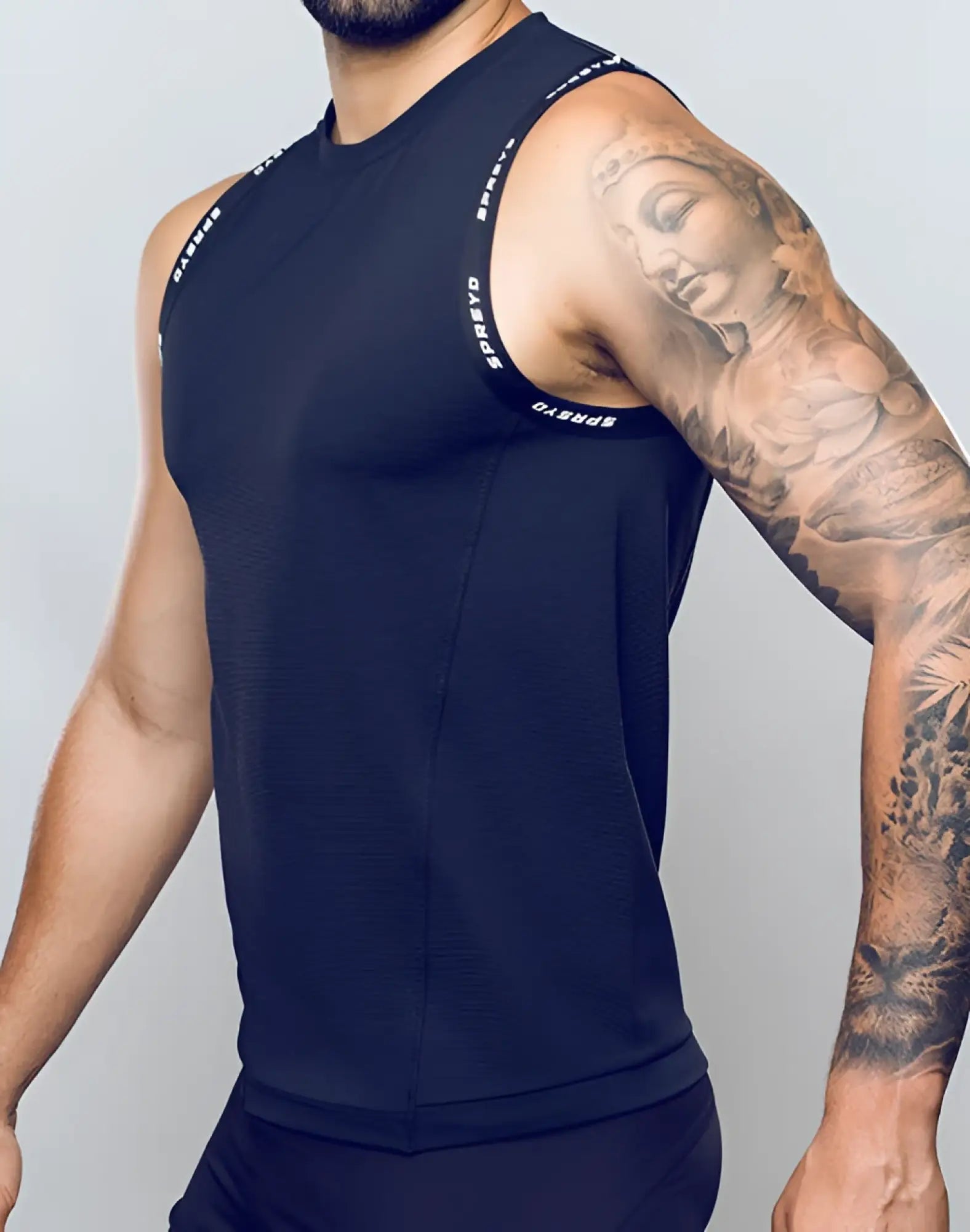 SupaWear SPR singlet black sleeveless athletic top with white spreyd branding along the shoulder seams