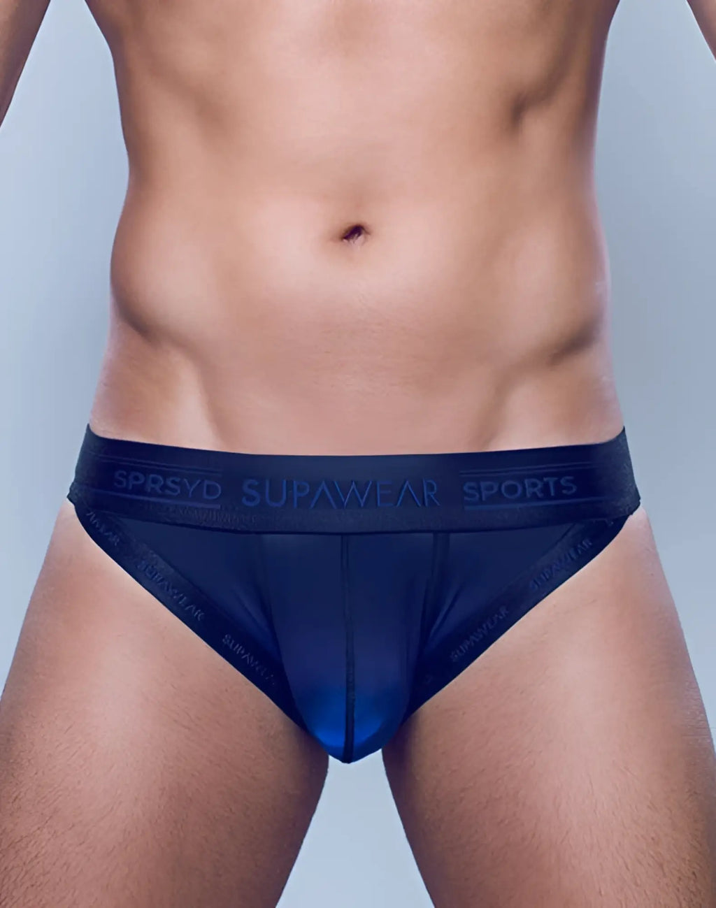 Navy blue SUPAWEAR SPR training briefs with a subtle gradient and branded waistband for sports use