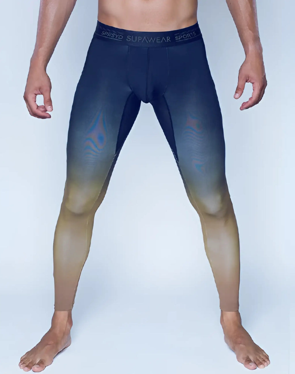 SupaWear SPR training tights in black and gold gradient compression fabric with iridescent pattern and Surawear waistband
