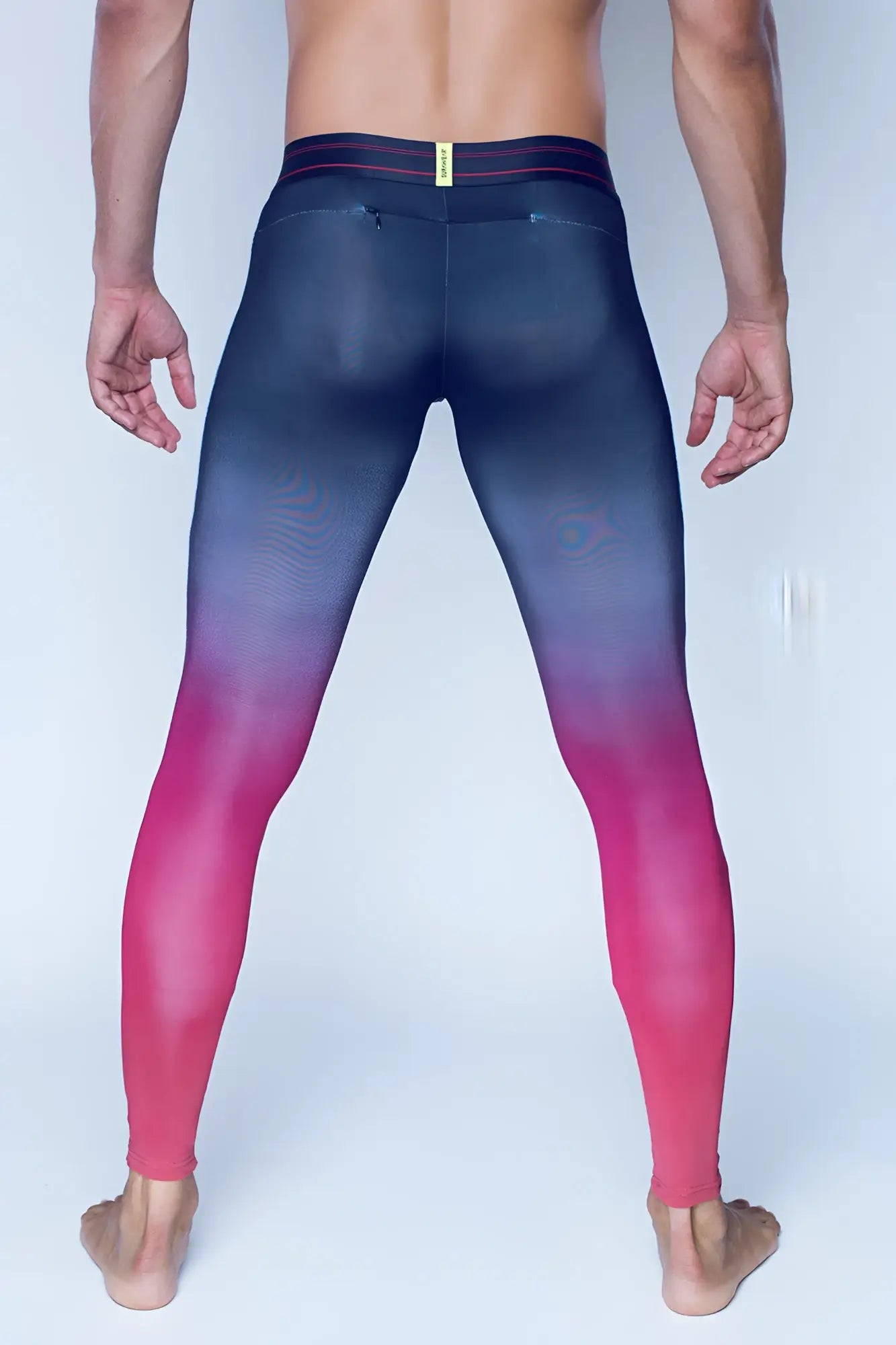 SupaWear SPR training tights in red with gradient smooth leggings transitioning from navy waist to pink ankles