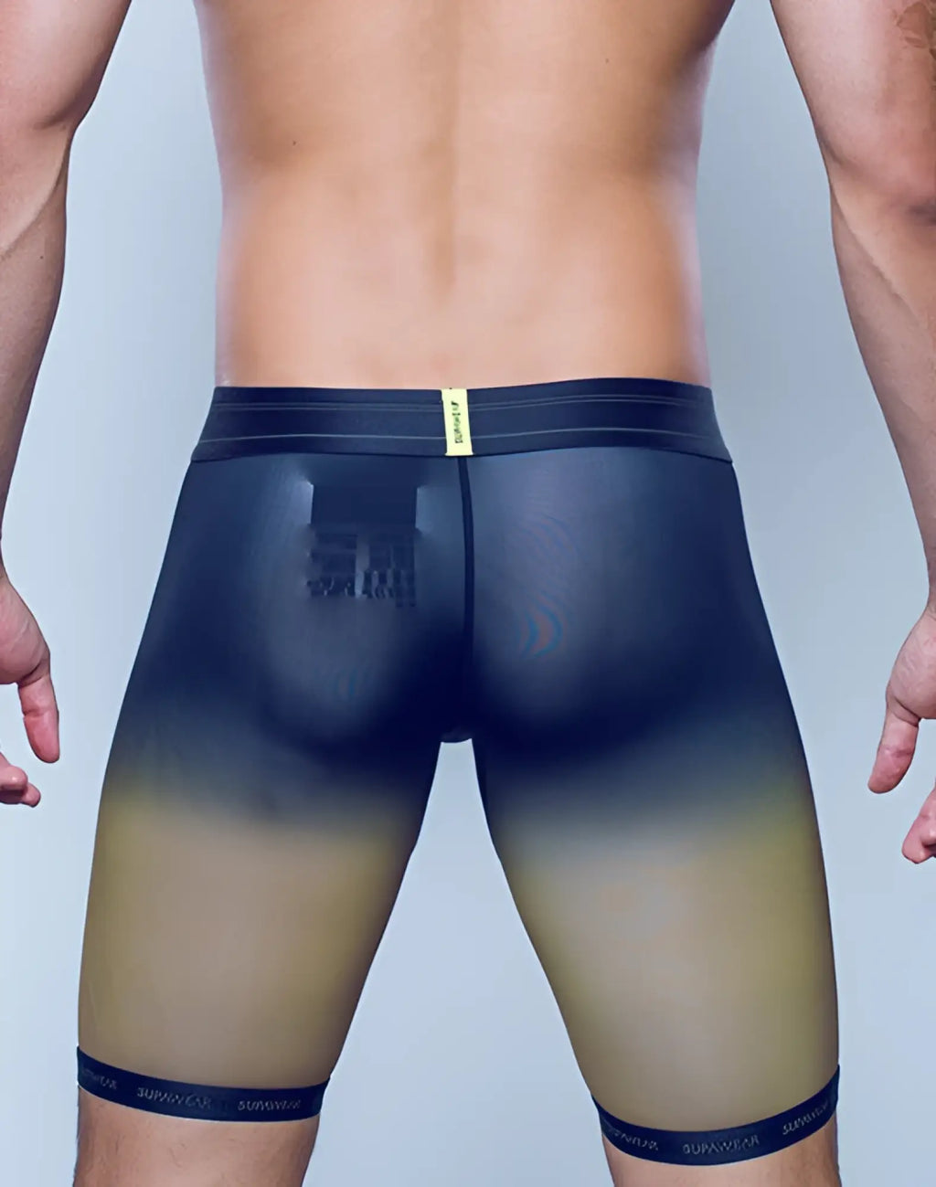 SupaWear spr training trunk underwear in green with black and gold gradient compression shorts featuring a sleek, form-fitting design