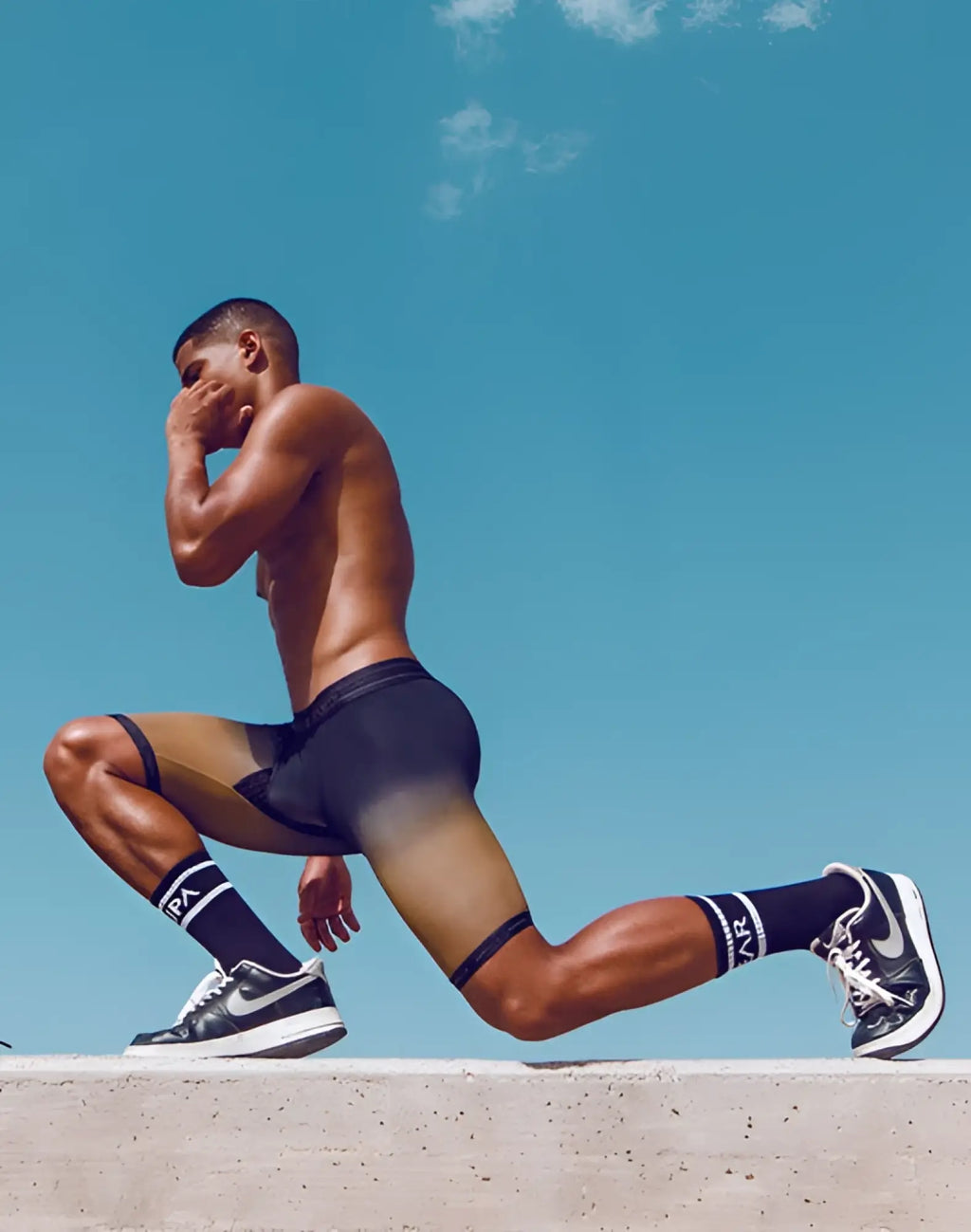 Black nike air jordan 1 sneakers with white soles and laces shown with green supawear SPR training trunk underwear