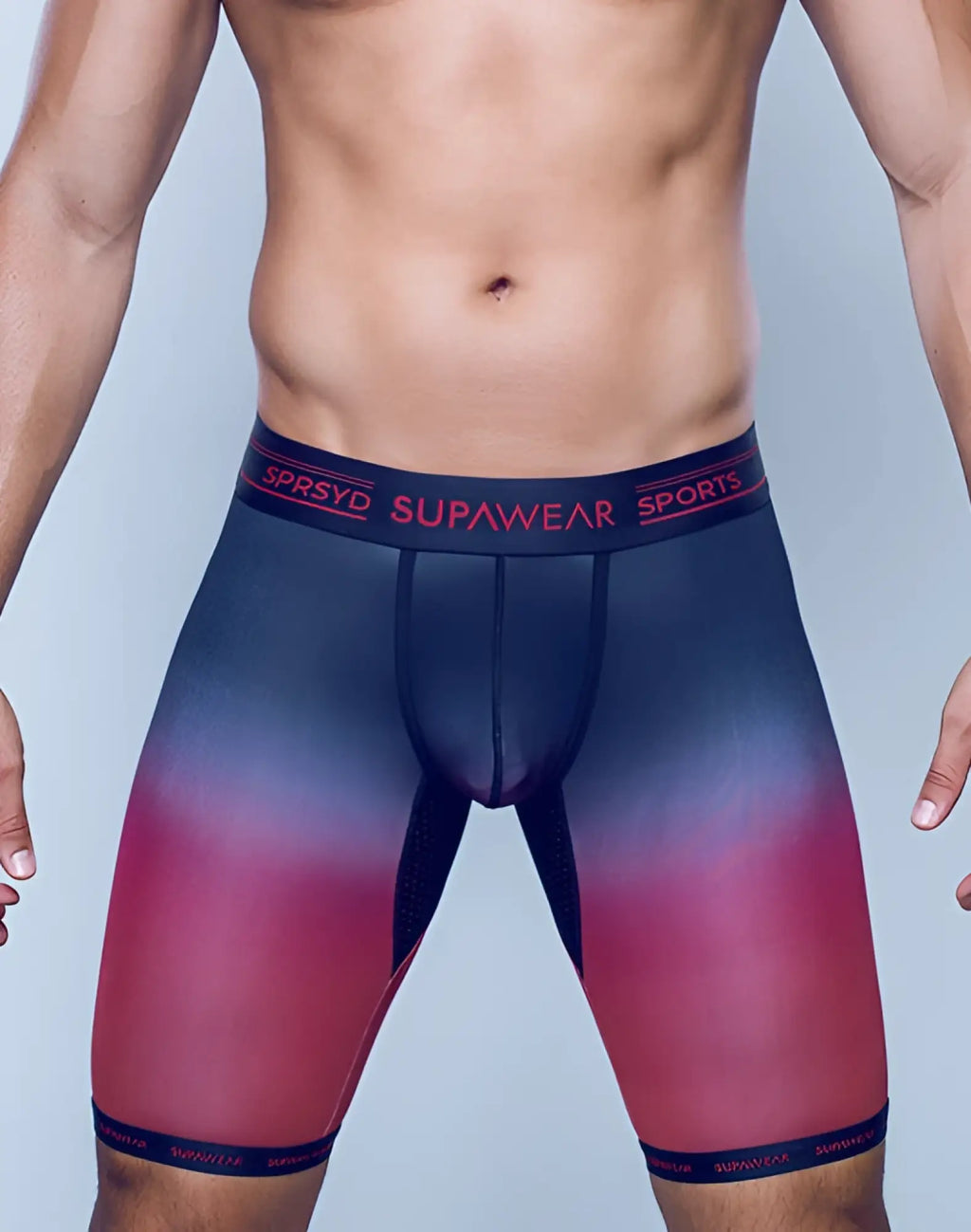 Men’s SUPAWEAR SPR training trunk underwear in red with compression fit, gradient blue to red design, black waistband and cuffs