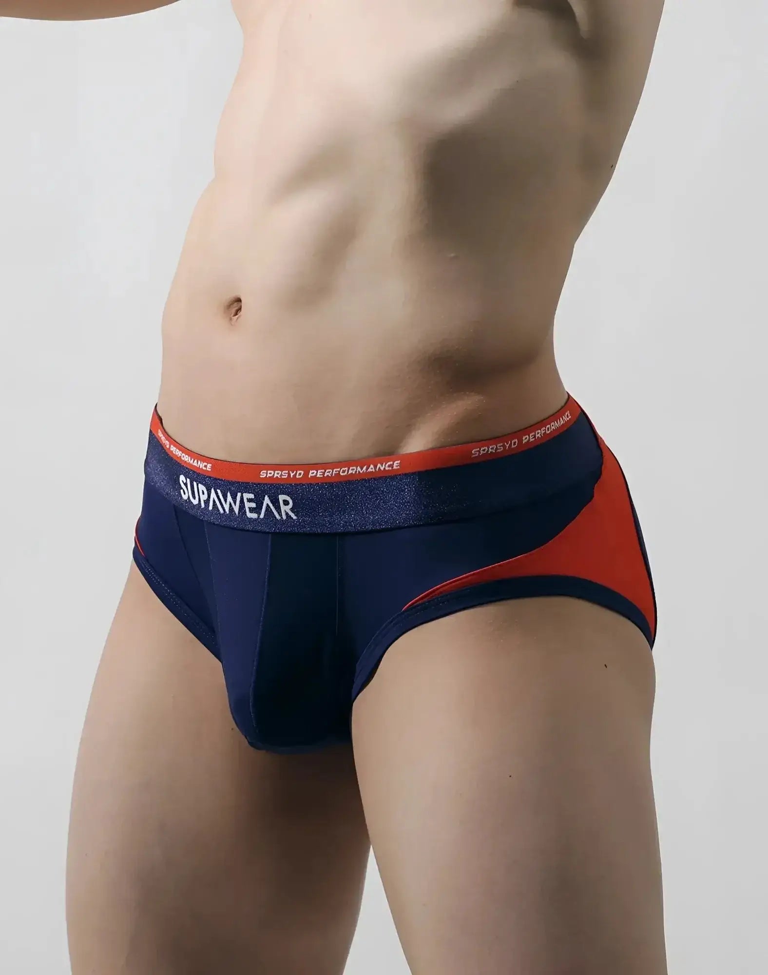 Navy blue and red SUPAWEAR spr verve brief underwear with textured waistband and supawear branding for athletic use