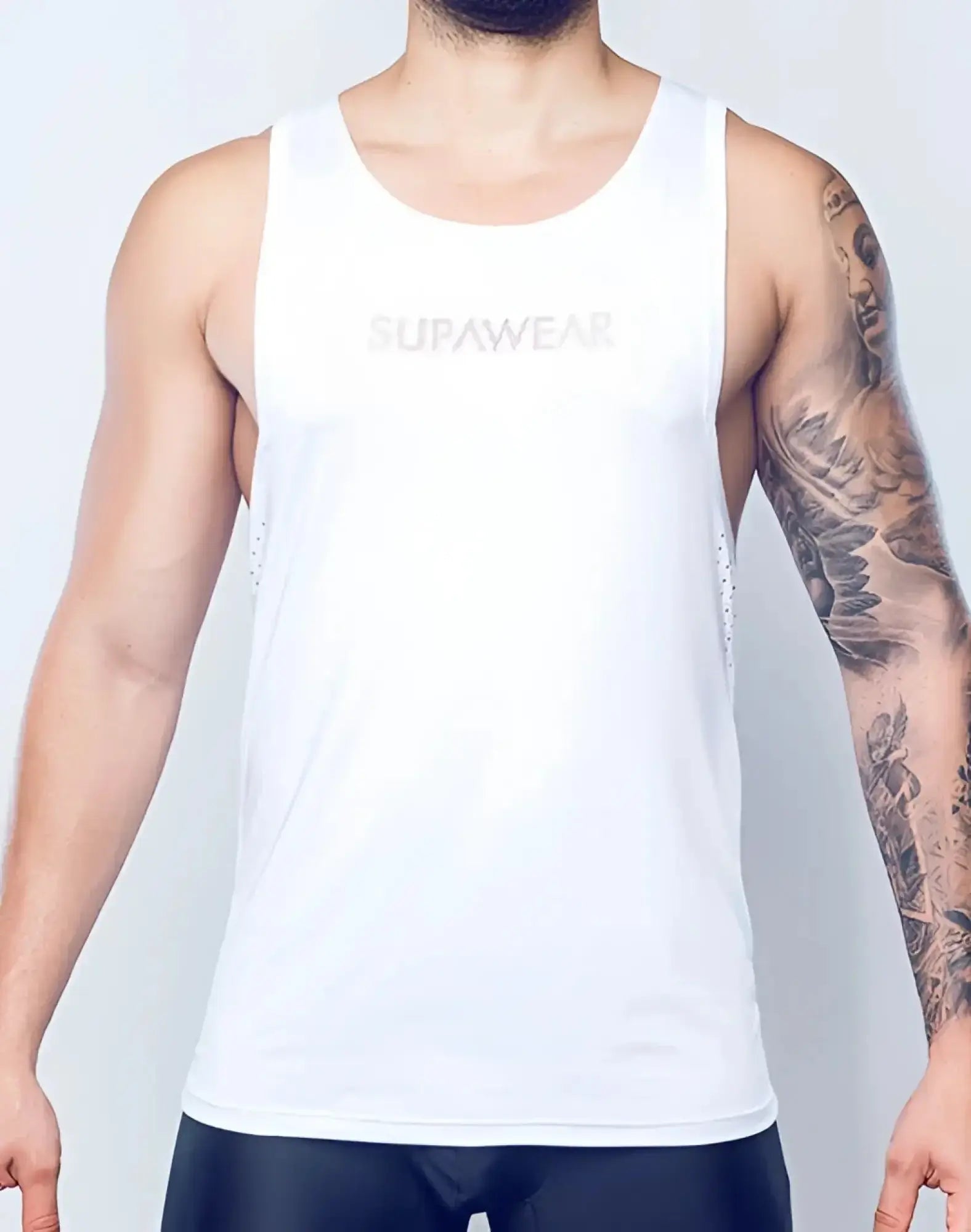 SupaWear SPR Y-Tank white tank top with subtle mesh detailing on the sides for breathable comfort