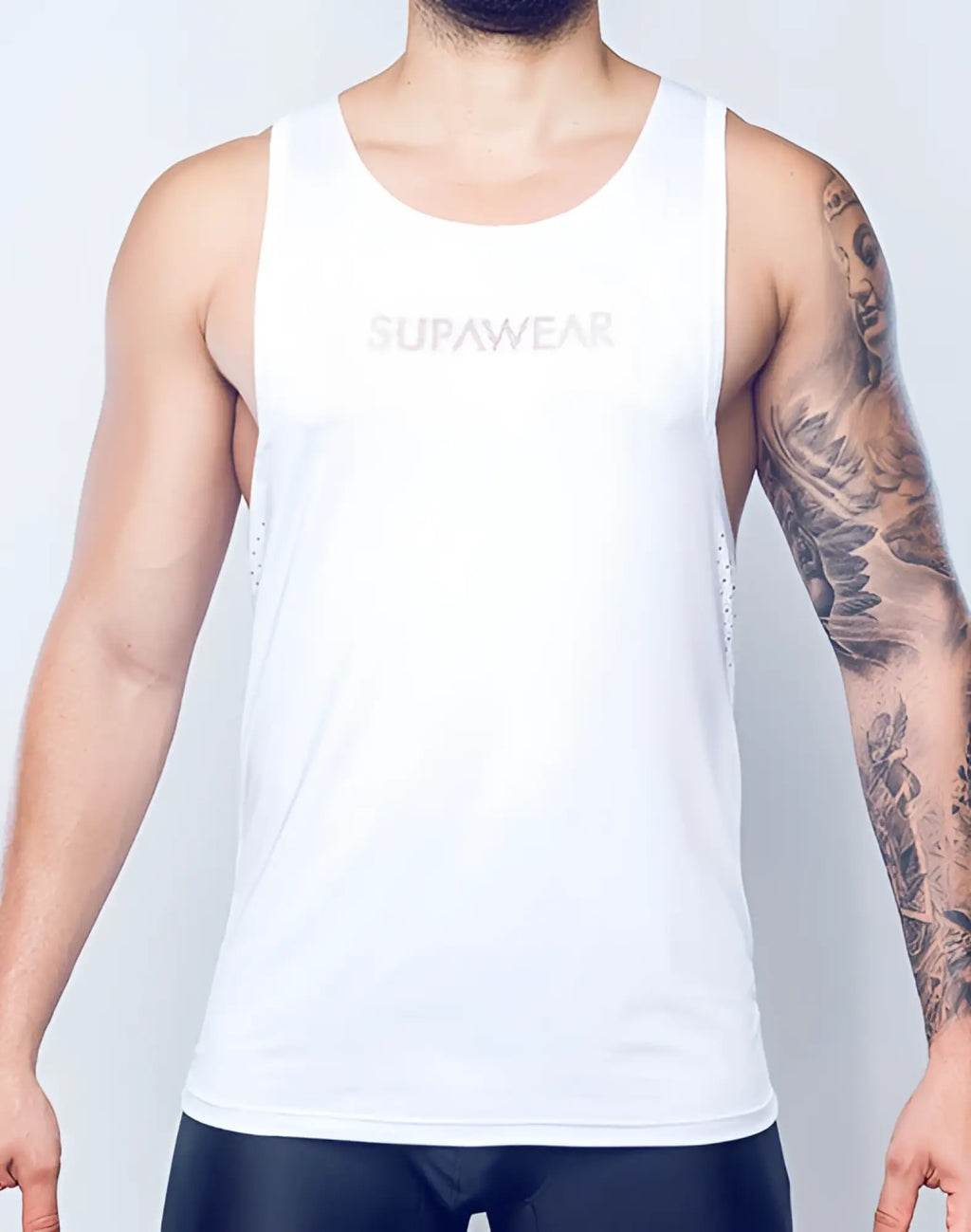SupaWear SPR Y-Tank white tank top with subtle mesh detailing on the sides for breathable comfort