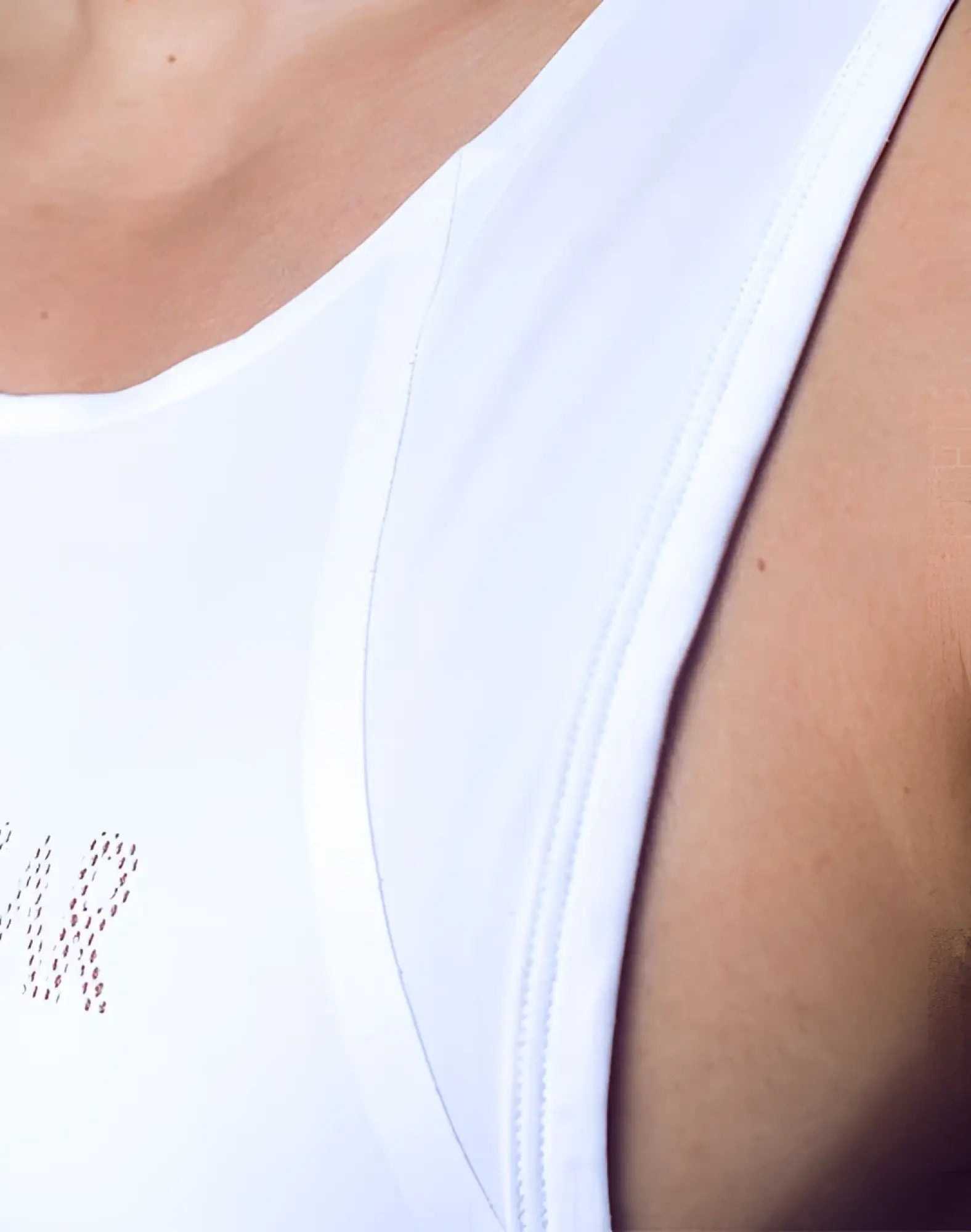 White supawear spr y-tank tank top with subtle mesh detailing and sleek fitted design