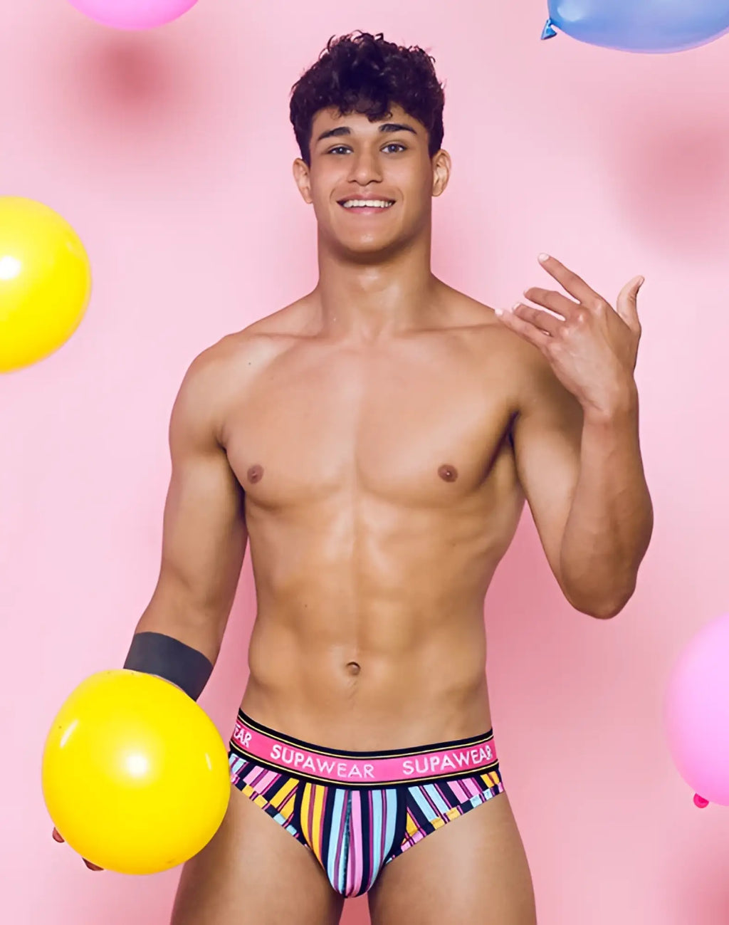 SupaWear sprint brief underwear with vibrant multicolored stripes and pink and black trim for men’s comfort