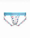 A white supawear sprint jockstrap brief with playful pink blue and gray polka dots and a light blue waistband