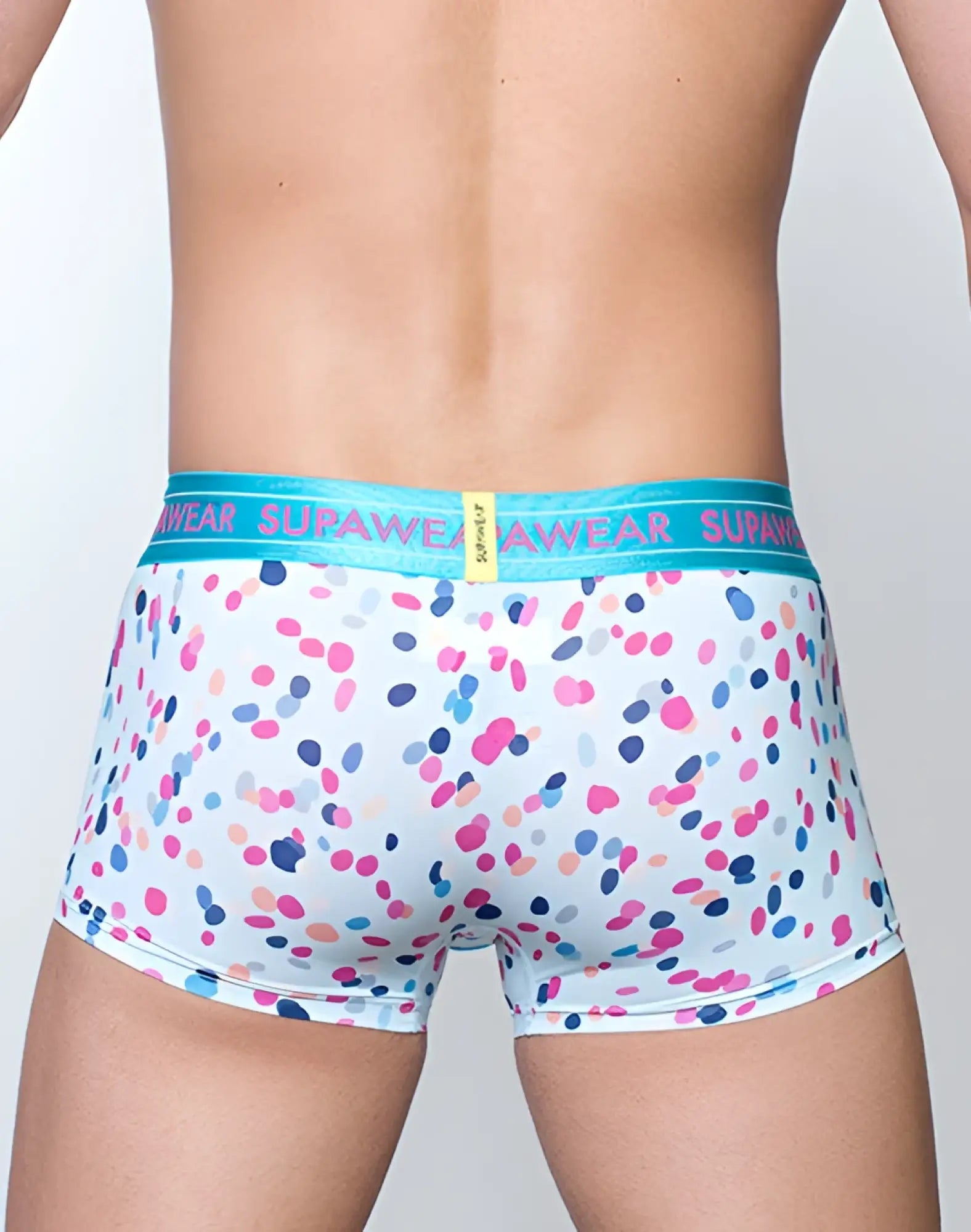 White boxer briefs with pink blue and light purple polka dots and teal supawear waistband sprint trunks underwear