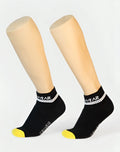 Black cleawear SUPAWEAR SUPA ankle socks with white striped band and yellow toe tips for everyday comfort