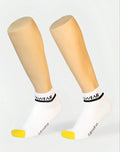 White SUPAWEAR SUPA ankle socks featuring black branding and yellow toe tips for comfortable everyday wear