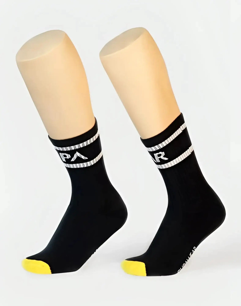 Black supawear supa crew socks with white striped bands yellow toe and a logo for athletic use