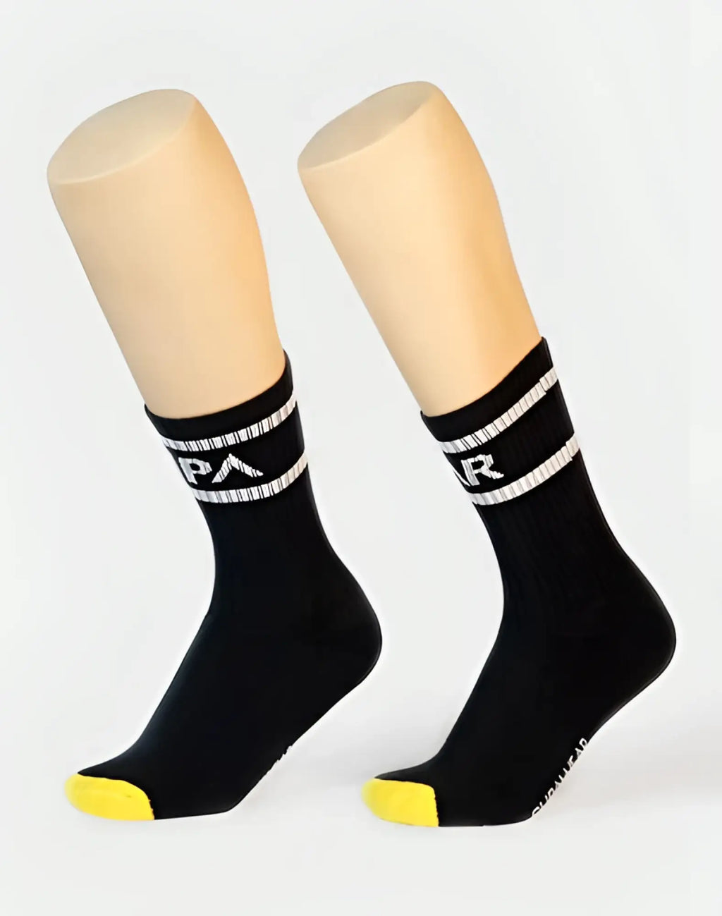 Black supawear supa crew socks with white striped bands yellow toe and a logo for athletic use