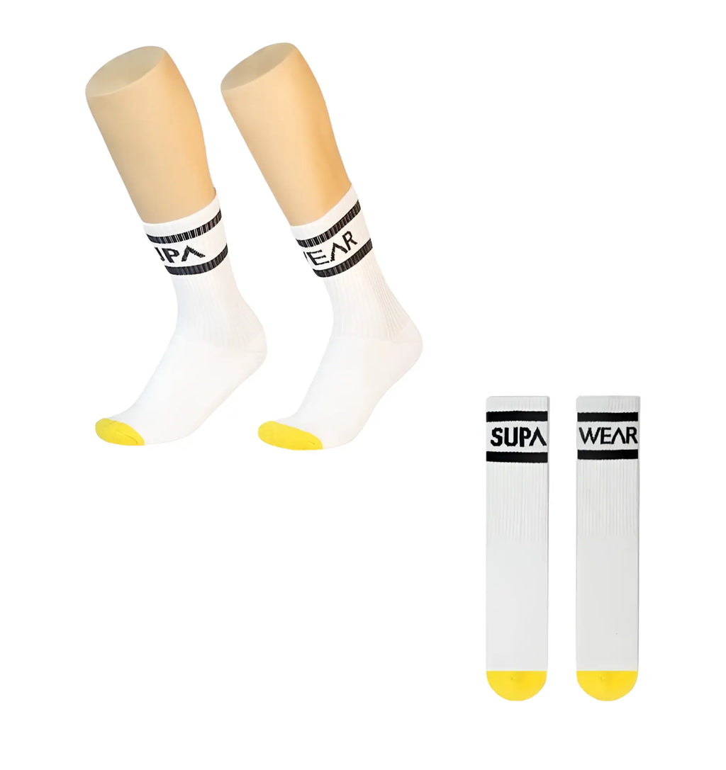 White supawear supa crew socks featuring black branding and yellow toe tips for casual wear